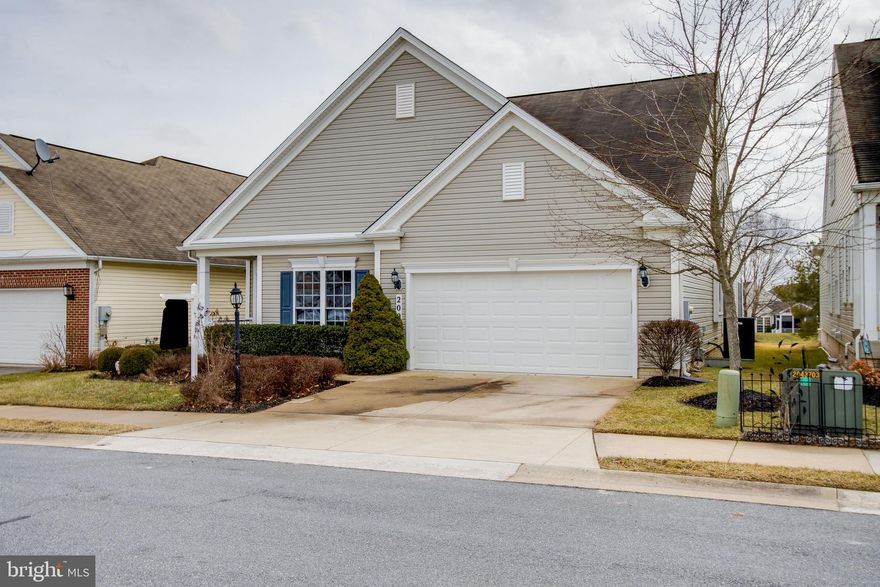 Fall in love with this gorgeous Claremont home offering a second-floor loft and ensuite. With an open concept floorplan and a dramatic entry foyer let the gleaming wood floors capture your heart. The gourmet kitchen has beautiful granite countertops, stainless steel appliances & upgraded cabinetry for the discerning chef. A grand two-story family room opens to a ceramic tiled all-season Florida room filled with natural light and an entryway leading to the maintenance-free deck where you can enjoy the open space views and a beautifully lighted gazebo. Your extra-large master ensuite provides French doors leading to a lovely tiled bath offering a soaking tub, double vanity, walk-in shower, and water closet.
The upper level provides a perfectly private area for your visiting guests to enjoy. Come participate in all the wonderful Carroll Vista active adult activities & amenities. Make this your dream home today!
