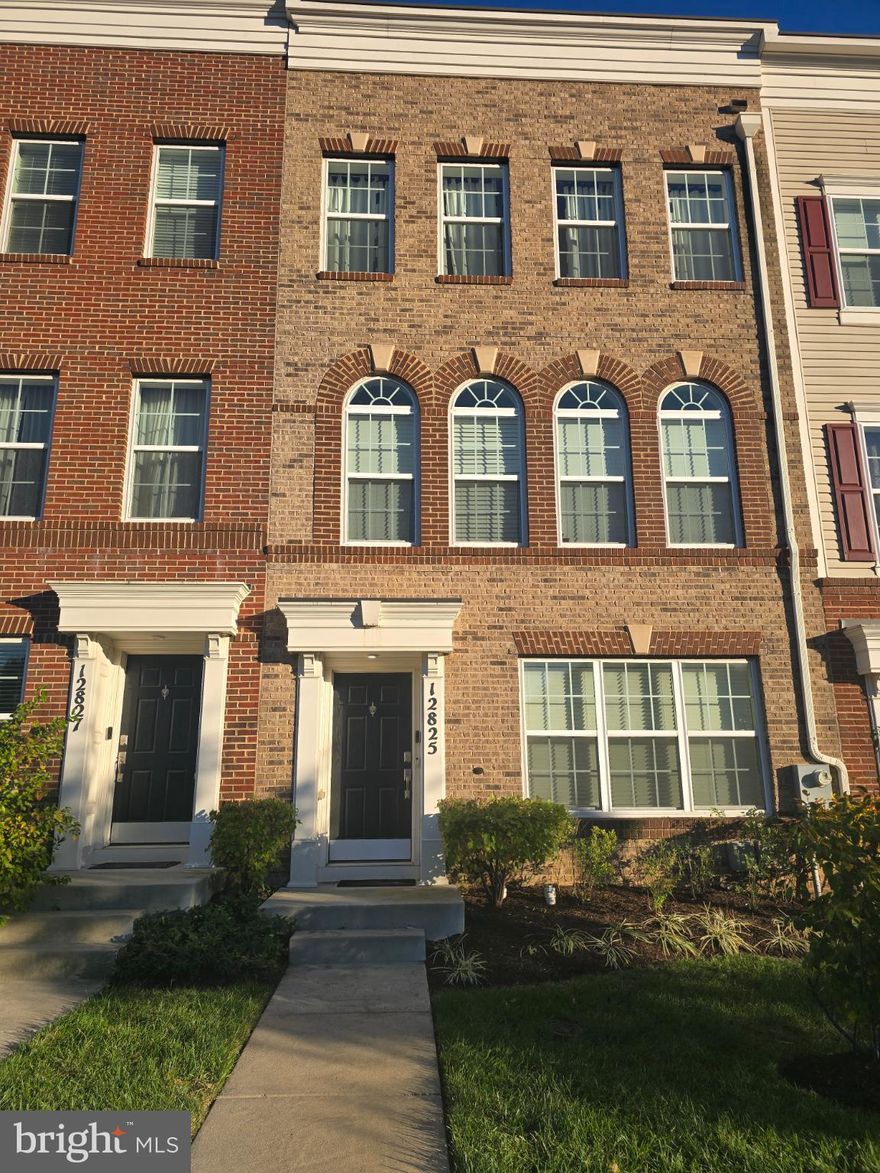 Beautiful and well cared for town home in the sought after Brickyard Station community. This lovely and diverse community features 2 lakes with walking trails, community center and gym! This grand 4 BR 4.5 bath home boasts 4 levels of living with a beautiful rooftop deck with the best sunsets and views! The large and open main level features a gourmet kitchen with oversized island and kitchen in the center of the level. A large dining room on one side and open living room on the other featuring a lovely marble built in electric fireplace. The main level includes a room with its own double doors and bathroom that can also be used as either a bedroom or a home office. The 3rd level has 2 large bedrooms, one being the master with an ensuite with step in shower. The other room is almost as big with beautiful natural light. Both rooms feature walk-in closets. The top level has its own living area and bedroom and another full bath. The top level also has an enclosed/yet open roof top deck space. You do not want to miss this opportunity make this home yours! The neighborhood has additional features of being in walking distance to the MARC train station, close to highways and shopping as well as having both a coffee/dining shop and nail salon on site in the community.