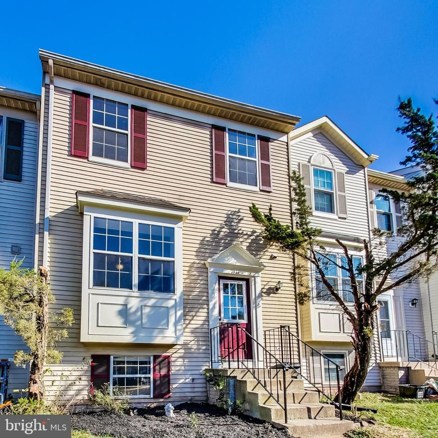 JUST RENOVATED!  This 3 BR/2.5BA interior unit townhouse has just undergone a refresh.  Improvements include new roof, exterior/interior paint, new decking, new LVP flooring on the main floor, new carpet upstairs and down, and new bath vanities and fixtures.  Come inside to a nice-sized living room, main-level powder room and a kitchen with a separate dining area and access the rear deck offering a great outdoor living space in the summer months.  Upstairs you will find a spacious primary bedroom and private bath with a stall shower.  Two additional bedrooms share the hall bath with a tub shower.  Don't miss the partially finished walkout basement including a family room, laundry room, and storage/flex room.  Step outside to a private, fenced backyard.  Conveniently located near downtown Manassas, commuter routes, shopping and schools, not-to-mention an easy walk to the park!  2 assigned parking spaces and additional guest parking available.  Sold strictly 'as is'.  View 3D Virtual Tour for more photos.