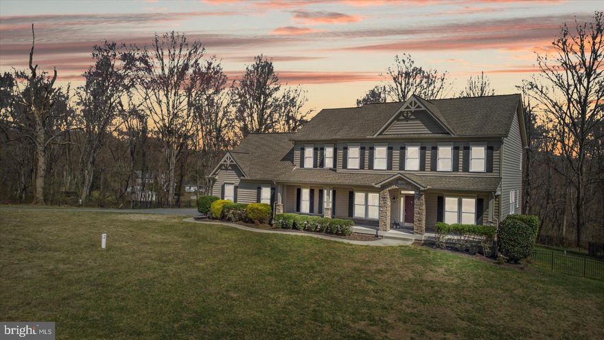 Breathtaking 4BR/3.5BA grand Colonial sits atop a beautifully landscaped yard surrounded by adult trees in the peaceful neighborhood of  Derby Farms. Make your way through the neighborhood to the driveway entrance of your new home.  The long/wide driveway takes you just outside the three-car garage with a walkway leading to the covered porch boasting stacked stone columns with an entry portoco. Step into an stunning open concept floor plan boasting tons of natural light with gorgeous hardwood flooring throughout.  The spacious entry offers a view of almost every living space on the main floor beginning with french glass doors leading to a home office and a large opening into the oversized dining room.  Walk through into the heart of the home featuring an amazing kitchen, breakfast room, and spacious family room featuring a gas fireplace with a brick accent wall. The kitchen offers plenty of cabinets, a large walk-in pantry closet, stainless steel appliances including a micro/wall oven combo and gas cooktop, a double sink set into a large island with a raised breakfast bar offering seating and bookcase shelving on either side.  Between the kitchen and dining room, on the way to the mud room, is a butler's pantry with a beverage fridge. The mud room gives you access to the three-car garage and features wainscoting with a built-in bench and coat hooks. Pass by the half bath on the way to the stairway leading to the second floor offering a grand primary suite featuring a large walk-in closet, an impressive walk-through closet, and a primary ensuite featuring a large walk-in shower, a soaking tub, and a double sink vanity with a primping station between.  The second bedroom is a primary size with a private full bath, third and fourth bedrooms feature a jack-n-jill full bath between them, and the convenience of second floor laundry.  The lower level is a blank slate with tons of potential to become additional living space, and features a sliding door to the fenced yard.  From the breakfast room step out to a covered deck with steps to the paved patio featuring stone walls and a built-in serving station, ideal when hosting family events. This home is move-in ready and has so much to offer new homeowners.  Imagine all this and in close proximity to shopping, restaurants, and commuter routes.
