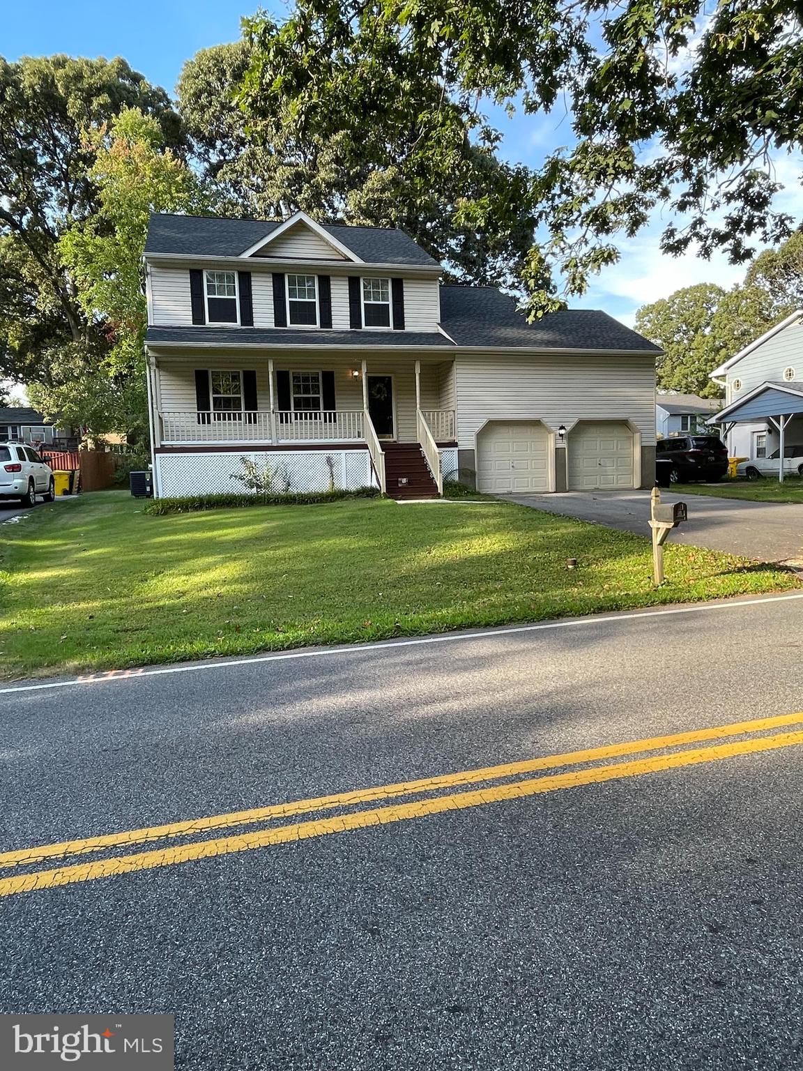2 story colonial with full basement and 2 car garage has 3-4 bedrooms, and 3.5 bathrooms. The Primary bedroom has a private bathroom and a walk-in closet. On The top floor there are 3 Bedrooms plus down the hall a DEN/OFFICE/NURSERY/CRAFT ROOM. There are 2 full bathrooms on this top floor, a powder room on the living room level, plus a full bathroom in the basement. The unfinished/insulated basement is divided into two sections including a laundry/utility/ storage area. The larger section is ideal for use as an exercise area or a child's play area. There is a covered front porch as well as a large deck overlooking a level back yard. The two car garage comes with two garage door remote control units. The house is just about midway between Broadneck High School and Cape St. Claire Elementary School & Kindergarten. Pets allowed but dogs only and limited to 25 lb maximum with pet deposit.