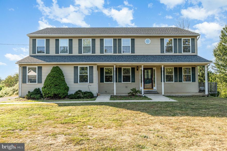 A LOT OF HOUSE FOR THE MONEY in a beautiful country setting! This spacious 6 bedroom, 4 full bath home in the Greencastle School District offers over 4,100 square feet of living space and endless possibilities. Bring your vision and finishing touches — the home needs some cosmetic updates, but the solid structure, thoughtful layout, and incredible space provide the perfect canvas to create your dream home.

The main level features a welcoming covered front porch, a bright living room, formal dining area, and a large kitchen with plenty of workspace. The upper level boasts generously sized bedrooms, including a true primary suite, and additional baths to accommodate a large household or guests.

The walk-out lower level is designed as an in-law suite, complete with its own kitchen, dining area, living space, and private entrance — ideal for multi-generational living or hosting extended family.

Step outside to enjoy the expansive wrap-around deck, perfect for outdoor entertaining while overlooking the private backyard. A side-entry 2-car garage adds convenience and storage.

All of this in a quiet, country location just minutes from schools, shopping, and commuter routes. With a little TLC, this home could truly shine — offering incredible square footage and flexibility at an unbeatable value.

Don’t miss the opportunity to make this your forever home!