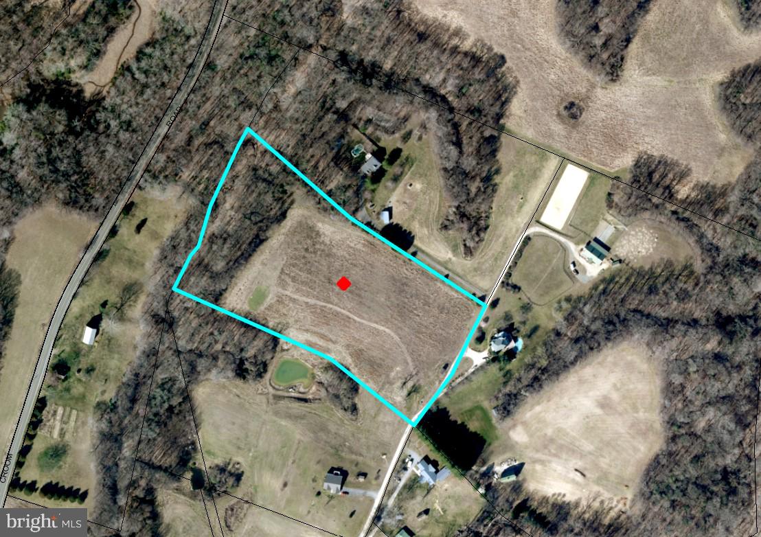Open Land! Rare opportunity to set up your own farm, vineyard, equestrian site, or just live in a private park-like setting! 9.1+/- acres of beautiful, large rolling land, less than 1 hour from the DC / VA Metro corridor, minutes away from Waldorf, Upper Marlboro and Prince Frederick. –Located in the Maryland Wineries Association's newest wine trail, "Legacy Wine Trail" and just minutes away from the Merkle Wildlife Sanctuary, the Jug Bay - Patuxent River Park System ( open to hiking, and fishing) and seated in Prince George's County's "Rural Tier," this is an opportunity that shouldn't be passed up! Percolation approved and ready to build your dream home in the country. Large open area to have animals or livestock. Partially wooded with a small stream that flows along the property line. Property has been surveyed and all corners are clearly marked. Opportunity to create homestead or small farm . Private and quiet, this lot is surrounded by farmland and close to Patuxent River Park Natural areas open to hiking, and fishing.