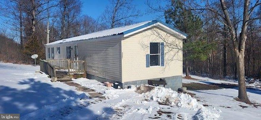 Endless potential awaits with this 3-bedroom, 2-bathroom home nestled on a 1.062-acre lot in Paw Paw, WV! This property offers a unique opportunity for investors or ambitious homeowners to create their dream retreat. While renovations are needed, the spacious layout and peaceful surroundings make it the perfect canvas for your vision. The sizable lot provides ample space for outdoor activities, gardening, or even expansion. Located in a quiet area with the charm of small-town living, this property is just waiting for the right touch to bring it back to life. Don’t miss out on this affordable investment opportunity!