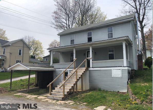 Spacious 2 story home in the Chester Hill section of Philipsburg, boasting 4 bedrooms with master bedroom and full bath on the first floor while the other 3 bedrooms and 2nd bath are on the second floor. First floor laundry off of the kitchen that also walks out to a patio area and backyard. There is an attached 1 car carport and the basement is a straight walkout. Pretty view from the large front porch.