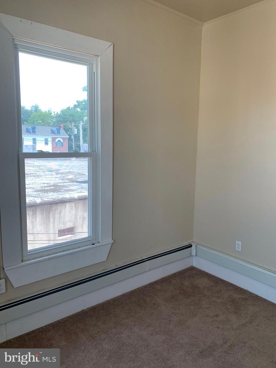Affordable rental in the heart of Centreville! 2 bedrooms, 1 full bath,  galley kitchen, private washer/dryer! High vaulted ceilings! Fresh paint! Rental located on second floor of private office building! Walk to all in town amenities!