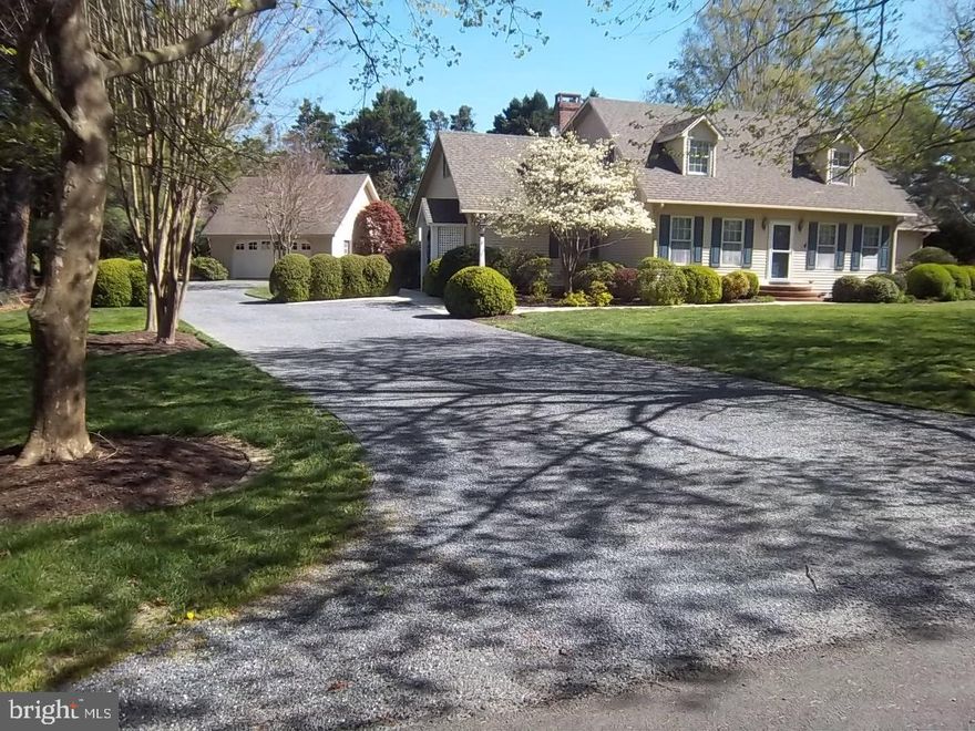 Just (3) miles west of downtown Easton, MD, in a small quiet neghborhood you will find this lovely home and gorgeous yard just waiting for a new family to enjoy it as much as the current owners have.  An open living area, seperate dining room, living room and a first floor primary suite. Up the stairs to the second floor you will find two additional bedrooms an office or gaming room, a playroom and a bonus room along with a full bath. Hard wood floors thoughout. An updated kitchen featuring and island, gas cook top, double oven and plenty of cupboard spaces. Off the kitchen is a breakfast/lunch area overlooking the pool and a well landscaped back yard. There is a two car detached and heated garage with a walk up attic storage area, back of the garage you will find a potting shed and next to the garage is a concrete pad for boat or other toys to be stored. Just around the corner is a small boat launch great for kayaks, canoes and small boats  - 5 miles to a County boat ramp by the bridge at Newcomb and about 8 miles to St. Michaels
To consider: No HOA, No town property taxes, Public septic managed by the County, Traffic light to access Rt. 33 (St Michaels Rd.) or take Glebe Rd into Easton with access to shoping and traffic lights to cross the Parkway to head downtown. A lot of Plus's with this lovely property