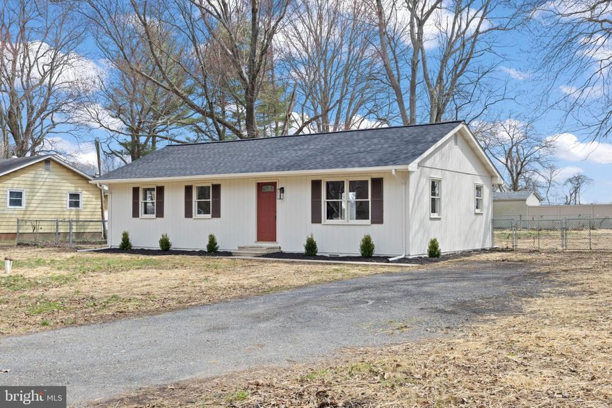 All one floor living on quiet street with large fenced yard and mature trees close to the bay! Lovely renovations and brand new kitchen with solid white shaker cabinetry including soft close dovetailed drawers and new stainless steel appliances PLUS BRAND NEW ROOF! Brand New septic system to be installed by settlement! ABSOLUTE MUST SEE HOME!