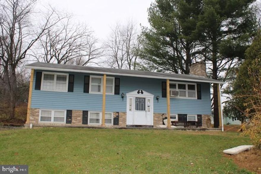 Bi-Level Home in a Peaceful Rural Setting. 3 Bedrooms, 1 1/2 Baths. Opportunity Awaits: This home needs some TLC, making it the perfect canvas for buyers looking to add their personal touch. Whether you’re a first-time buyer, investor, or DIY enthusiast, this property offers incredible value and potential. Generous lot 0.53 with room for gardening, outdoor living. Home is being Sold As-Is /Where-Is.