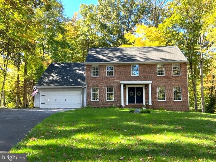 Location!!! Minutes to both downtown Annapolis and commuting routes to DC and Baltimore.  With almost 2 acres of privacy, this picture perfect pottery barn home is located on a quiet cul-de-sac backing to wooded area and boasts a traditional and open floor plan.  Upper level includes an updated super master suite w/ sitting room and remodeled bath, 3 additional large bedrooms and  another remodeled full bath.   Gorgeous wood floors on the main level, spacious formal dining, separate living room, step down family room with wood pellet stove, main level bedroom/office.  Enormous unfinished lower level with workshop area, 2 car garage leading to main level laundry and mud room, amazing new rear patio.  Newer hvac(2021)- w/ Gen 3 Nest thermostat , radon system, drainage and grading upgrades, custom Roman shades, and much more.  Coming soon!