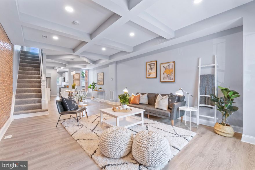 Welcome to your dream home! This stunning 4 -Bedroom, 3-Full Bath residence combines modern luxury with classic charm. Step into an open living and dining area bathed in natural light, perfect for entertaining and family gatherings. The space features  beautiful exposed brick walls and sleek recessed lighting, creating a warm and inviting ambiance. The fully finished basement offers additional living space, gym or media room. Each bedroom is generously sized, providing comfort and privacy for all. The stylish bathrooms are designed with high-end fixtures and finishes, ensuring a spa-like experience at home. This home is rare to find, don't miss the opportunity to make it yours!