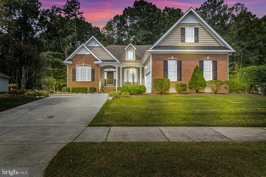Updated color palette  Master dressing closet area spacious powder room.

You are invited to explore this custom built home, in the quiet community of Grace Hill. Grace Hill is surrounded by woods located a couple of miles from the small town of Kilmarnock. This well maintained home includes over 2500 square feet of finished space and 818 square feet of unfinished space; complimented by a conditioned crawl space for energy efficiency and extra storage. This open concept, split bedroom floor plan has an updated neutral color palette. French doors open to a bright and spacious office. Across the entry is the formal dining room encompassed by architectural columns and custom wall moldings which bring a dramatic focal point to the space. The relaxing central living area is highlighted a gas fireplace. The kitchen is equipped with 42 inch cabinetry, granite countertops, double pantry and an island with breakfast bar. Stainless steel appliances include: gas range and oven, as well as, newly updated refrigerator, dishwasher, microwave and garbage disposal. Adjacent to the kitchen is a sizable sunlit alcove with a cathedral ceiling. Great for casual dining or conversation space; where the back door leads on to a huge deck overlooking the naturally wooded backdrop. Left of the central living space, are two guest bedrooms and a three piece bathroom. On the right side of the central living space is the primary suite. Featuring an ensuite bath, with separate toilet room, double sinks, deep soaking tub and walk in shower; leading into a master dressing closet area. Additionally, on the right side of the central living space is a spacious powder room, and a nicely sized utility room with built in cabinetry. Past the laundry, up the stairs, is the bonus room with a full size walk in attic, great for storage or potential expansion. Experience peaceful living in this lovely home and friendly neighborhood. Schedule your showing today. All offers require a $10,000 EMD and if financed, must be accompanied by lender pre-qualification letter.