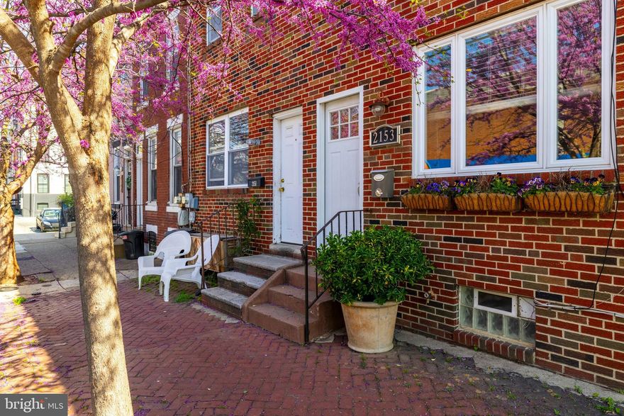 Welcome to 2153 E Hagert Street!  This 2 bed / 1.5 bath charmer with AC has been beautifully maintained and is perfectly sized for easy living in close proximity to everything that Fishtown has to offer. Walk up past the window boxes and Eastern redbud tree to the front door and enter through the foyer, which serves as a welcome buffer from the elements. You’ll immediately notice that this home is full of light as a result of the thoughtfully designed window placement including the large picture window in the front, as well as recessed lighting. The 4 inch hardwood floors you see in the open concept living room / dining room also continue throughout both floors. The bright and sunny kitchen features custom cabinets with dovetail drawers and easy close gliders, GE stainless steel appliances including a gas range, sleek granite countertops, and a tiled floor for easy clean-up. Through the kitchen’s sliding glass doors, you access the outdoor living space perfect for indoor-outdoor entertaining year round. The first floor is completed by a coveted first floor powder room. The second floor has two spacious bedrooms, both with ceiling fans for air circulation and abundant closet space.  The oversized full bathroom includes a combination tub and shower as well as a large custom vanity. The dry, full height basement is where you’ll find the laundry center and plenty of room for storage. Because of its proximity to the Horatio B. Hackett elementary school, street parking is easy to find on weekdays and even easier in the summertime. Walkability is key in Fishtown and you are steps from Vessel Coffee Collective, Philadelphia Brewing Company, Circles and Squares, Fiore, and Meetinghouse.A few minutes more and dinner at Suraya, LMNO, or Kalaya or a drink at Johnny Brenda’s can become a regular occurrence.  Nestled in the heart of a vibrant neighborhood, with easy access to public transit, this location is perfect for those who want to immerse themselves in the city.