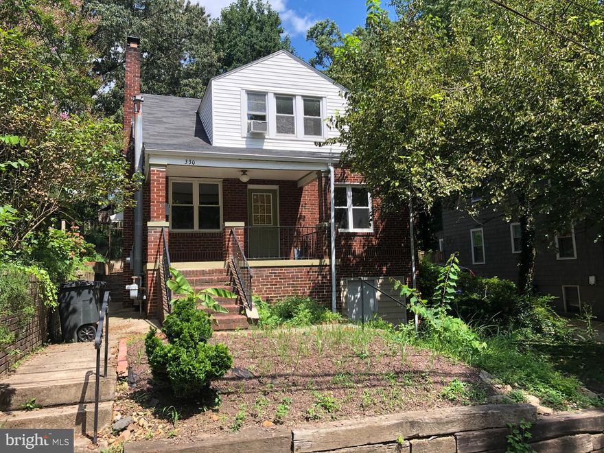 Brick Bungalow on desirable street in Takoma Park just steps from the beauty of Sligo Creek. 5 BRs/2 baths over two levels and a partially finished basement. Deep Takoma Park lot with 10,000 SF of space to garden and play in. Bones are solid, but the home is awaiting your TLC. Or bring your contractor and start planning the renovation. Being sold As Is.