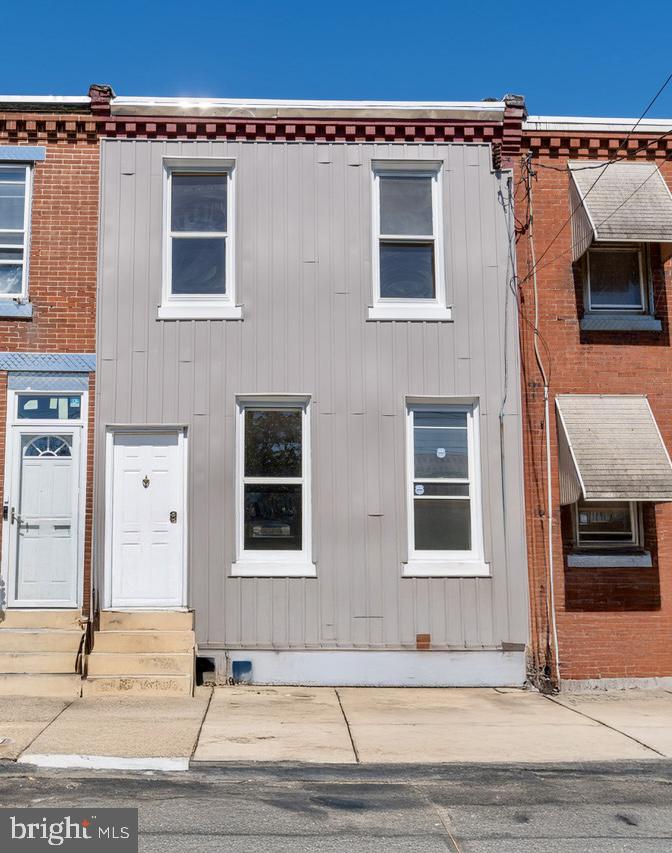Welcome to this beautifully remodeled row home in the heart of Philadelphia, where thoughtful design meets modern convenience. From the moment you arrive, the refreshed exterior offers a welcoming first impression, hinting at the stunning transformation within.
Step inside to a bright, open floor plan filled with natural light, complemented by sleek vinyl flooring and recessed lighting throughout the spacious living area. The seamless flow leads into the heart of the home , a stunning, open-concept kitchen featuring chic tile floors, an eye-catching backsplash, a central island perfect for entertaining, new stainless steel appliances and more recessed lighting to create a warm, inviting ambiance. A stylishly renovated powder room and a convenient laundry area add to the home's smart layout.
From the laundry room, step outside to your private, fenced-in backyard complete with a cozy deck — ideal for enjoying the warmer months with family and friends.
Upstairs, you'll find three generously sized bedrooms, each with recessed lighting, custom doors, and beautiful finishes that create a polished, upscale feel. The hall bathroom is a true standout, boasting modern tile floors, a floating vanity, and a luxurious tiled shower — all meticulously updated.
No detail has been overlooked in this complete renovation, including a brand-new central air system for year-round comfort. With its elegant touches, practical upgrades, and undeniable charm, this home is the perfect blend of style and functionality.