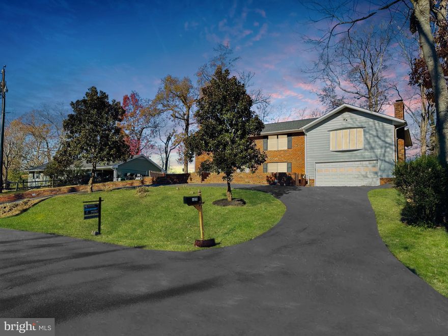 Welcome to your DREAM HOME! This beautifully renovated brick home is located in a quite and friendly neighborhood, situated on nearly half an acre. This spacious 2-level abode features 4,000 sq. ft. of luxurious living space, with refinished hardwood floors and an inviting open-concept kitchen equipped with quartz countertops and new appliances. It offers 5 bedrooms and 4 full bathrooms, along with both formal and casual dining areas. Enjoy cozy evenings by one of the 4 chimneys, or unwind on the expansive deck and in the screened porch. The property also includes a convenient 2-car garage and a semi-circular driveway, making it the perfect family retreat. Nearby restaurants, shopping, bus stops and Schools. Homes like this tend to sell quickly! Schedule your appointment today!