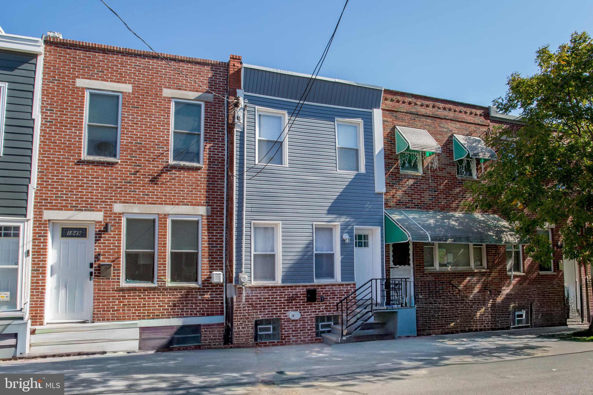 Welcome to 1847 Hoffman Street, a completely rehabbed South Philly gem offering 3 bedrooms, 1.5 bathrooms, and 1,200 sq ft of stylish living space. Step inside to an open layout with gorgeous new floors, recessed lighting, and a chef’s kitchen featuring sleek cabinetry, modern finishes, and a breakfast bar that’s perfect for your morning coffee or entertaining guests. Stay comfortable year-round with central AC, and take advantage of the semi-finished basement, ideal for a home office, gym, or playroom. Outside, the private concreted backyard provides the perfect low-maintenance space for relaxing or hosting BBQs. Nestled on a quiet block but just steps away from South Philly’s best restaurants, shops, and neighborhood favorites, this home blends comfort, convenience, and city lifestyle seamlessly.