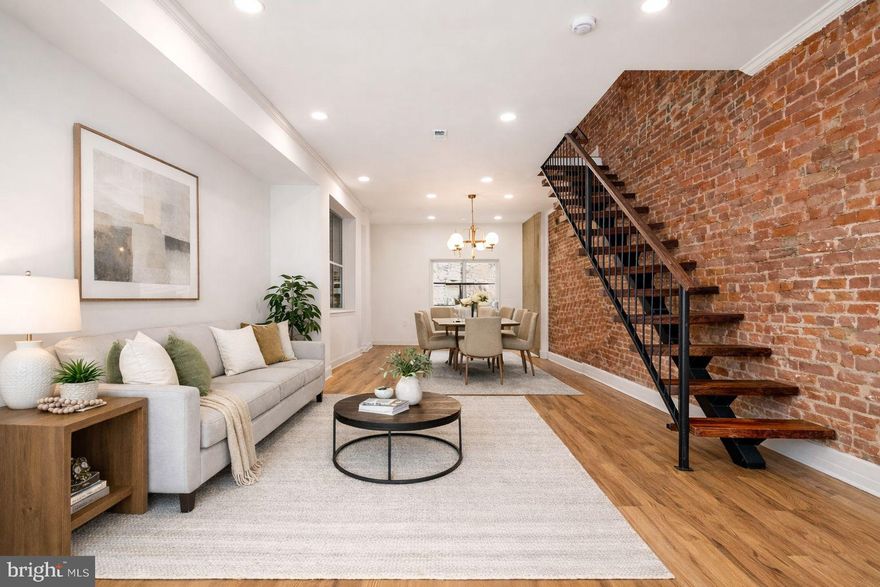 Welcome to 1231 S Markoe Street, a completely gut-renovated townhome located in Squirrel Hill, where every detail is brand new—from the systems to the finishes. This home delivers modern design, functional living, and turnkey comfort in a highly convenient West Philadelphia location.

The first floor features a bright, open-concept layout highlighted by striking floating stairs that create a clean, contemporary feel. The sleek galley-style kitchen anchors the space and flows seamlessly into the living and dining areas, making it ideal for both everyday living and entertaining. Sliding glass doors lead directly to a private, fenced backyard, perfect for outdoor dining, pets, or quiet relaxation.

Upstairs, the second floor offers two bedrooms, including a true primary suite with a walk-in closet and private en-suite bathroom. A full hall bathroom serves the second bedroom and guests with ease.

The fully finished basement expands your living space with an additional bedroom and full bathroom, ideal for guests, a home office, gym, or extended-stay setup.

Property Highlights:

Total gut renovation – all new construction finishes & systems

High-efficiency central air & HVAC

Open floor plan with modern floating stair design

Contemporary galley kitchen

Primary suite with walk-in closet & private bath

Finished basement bedroom with full bathroom

Fenced private backyard

Location & Lifestyle:
Squirrel Hill offers a quiet residential feel while remaining close to everything that matters. You’re minutes from University City, UPenn, Drexel, and Center City, with easy access to public transportation, major commuter routes, neighborhood parks, local restaurants, cafes, and everyday shopping. The area is well known for its strong sense of community, walkability, and convenient access to Philly’s cultural and educational hubs.

If you’re looking for a truly move-in-ready, modern home with brand-new systems, flexible living space, and a prime West Philadelphia location, 1231 S Markoe Street is a must-see.