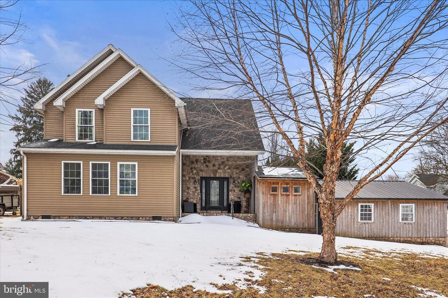 Welcome to your dream home, a charming residence nestled in the heart of East Berlin, where classic craftsmanship meets modern comforts. This delightful property features three generously sized bedrooms, two full bathrooms, and a half bath.

As you enter, you’ll be greeted by an abundance of natural light cascading throughout,  creating a warm and inviting atmosphere. The cozy living area, complete with a wood-burning stove, is perfect for relaxing evenings or entertaining friends. 

The heart of the home showcases exquisite craftsmanship, evident in the thoughtful details throughout. Imagine hosting gatherings in the spacious living spaces or enjoying quiet mornings in your charming kitchen, tailored for both functionality and style.

A standout feature of this property is the separate in-law quarters located in the basement, which boasts convenient in-and-out access. This versatile space can serve as a private suite for guests, an inspiring craft area, or a productive home office—adaptable to your unique needs.

Step outside to find a serene outdoor escape, ideal for enjoying tranquil moments or outdoor activities. With its thoughtful design and appealing features. There is a 777 square foot barn with the potential of a 273 square foot loft adding to it's charm. This space can be used as a workshop, extra storage, or a possible small business, the opportunities are endless! Oh, and don't forget the chicken house just in case you love feathered friends! The outhouse is a nice convenient touch as well! This home is ready to welcome you. Don’t miss your opportunity to create lasting memories in this wonderful East Berlin retreat! Schedule a tour today and experience the magic for yourself!