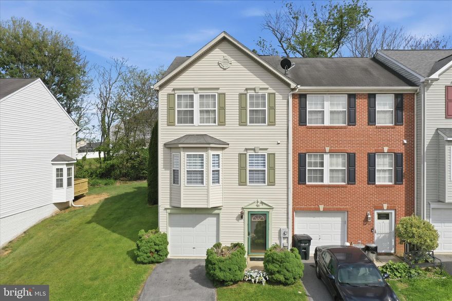 Welcome to 61 Quince Tree Drive! Skip the construction delays and move right into this stunning, turn-key end-unit townhome located in the highly desirable Laurel Ridge neighborhood of Martinsburg, WV. This home is completely move-in ready—fully furnished with high-end designer furniture and all appliances included! Laurel Ridge is famous for its fantastic community vibe. It is a wonderful neighborhood for daily strolls and walking your dogs, with beautiful, peaceful ponds located right out front where you can fish, unwind, and just relax.

From the moment you step inside the home, you will love the bright and airy open floor plan, enhanced by elegant bumpouts that maximize your living space. The home features a beautiful mix of classic hardwood and modern, durable Luxury Vinyl Plank (LVP) flooring. Designed with flexibility and accessibility in mind, this home boasts two spacious primary suites (master bedrooms), plus a third guest bedroom/flexible bonus room, alongside 2 full bathrooms and 2 half bathrooms. For added convenience, a professional handicapped-accessible chair lift is already installed.

Step outside to your premium end-unit lot, featuring a nice yard and a large rear deck complete with an awning—perfect for relaxing or entertaining. A one-car garage completes this amazing package.

Situated in a prime location close to local schools and shopping, this property is a commuter’s dream with quick access to I-81, making trips to Virginia, Maryland, Pennsylvania, and Washington, D.C. a breeze. Don’t wait for a new build—this designer masterpiece is truly turn-key!