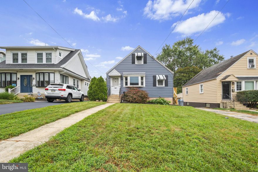 Step into a cozy living/family room that flows into a bright eat-in kitchen with generous cabinet space. The main level offers two bedrooms and a full bath—one of the bedrooms could easily be used as a formal dining room to suit your needs. Upstairs, you’ll find a spacious third bedroom featuring classic parquet flooring. The lower level includes a clean, partially finished basement with a powder room, laundry area, and direct walk-out access to the large backyard. Recent upgrades include a brand-new HVAC system, a newer installed French drain, and a side deck. To keep utility costs low, seller's installed a solar panel roof that comes with the home. Enjoy outdoor living with a huge backyard with a pergola to host company and storage shed for yard upkeep. Conveniently located near shopping, public transportation, and all the local amenities.