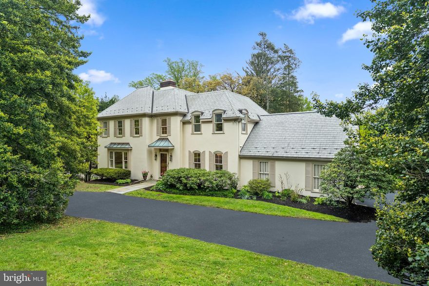 A picturesque and majestic beauty in one of the most sought-after neighborhoods on the Main Line!  Welcome home to 1227 Lafayette Road in Gladwyne.  This home is rich in history as being part of the historic Hartsdale Estate.  This gorgeous 4 bedroom, 2 full/1 half bathroom quintessential French Colonial is situated on almost an acre of sprawling landscaped grounds.  The grounds are truly magical!  The tiered deck is magnificent for everyday relaxing during the warmer months, and perfect for entertaining!  The ideal family home.  It boasts 3,170 square feet (excluding the 1,300 square feet finished lower level.)  In addition to having a premier convenient location, it is also located in the award-winning Lower Merion School District (Gladwyne Elementary, Black Rock Middle, Harriton High.)  The school bus pick up and drop off is conveniently located right in front of the house.  As you enter the home, prepare to fall in love with this GEM!  Gleaming hardwood floors run throughout the home.  Enter the home into the welcoming foyer.  To the left, is a very large living room with a beautiful wood-burning fireplace and an arched built-in bookshelf, which adds so much charm and character.  To the right is a well-sized dining room.  The bright and light-filled kitchen has a large window overlooking the backyard.  A door right off the kitchen leads to the deck.  Adjacent to the kitchen and with perfect flow is a sunlit family room with built-in shelving.  This room has Pella doors with access to the amazing deck.  The first floor is complete with a powder room, and a laundry/mudroom area directly off the kitchen with a back door to the 2-car garage.  The second floor includes a primary ensuite bedroom with a walk-in closet.  Three additional bedrooms and a hall bathroom complete the second floor.  The lower level is finished, it is the perfect additional living space or playroom, and there is also a storage room that could be converted to a home gym or home office.  The basement also has access to the outside.  This home has a newer roof (2015), and brand-new HVAC system (which comes with a ten-year warranty), a Generac generator, most of the interior was just freshly painted, as well as significant improvements to the exterior.  No stone was left unturned, or cost spared in preparing this home for its next owners!  This home has been impeccably maintained by the current owner and family.  1227 Lafayette Road is situated in an ultra-convenient location to reach all major conveniences including premier schools, shopping, and major highways.  Class and style at every corner, this will not last long!  Make your appointment today!