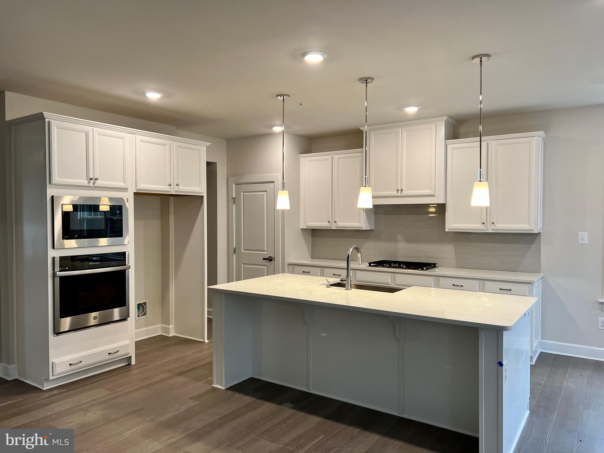 QUICK MOVE-IN: HOMESITE 9. SEPTEMBER DELIVERY. The Northshire carriage home at Ponds Edge offers all of the space and style youd expect from a single-family home. Enter to the first level and be greeted by an open and airy flex room thats perfect for formal dining, or choose the study for work-from-home ease. The gourmet kitchen is open to the great room and a casual dining space. A family arrival center sits just off the 2-car garage to keep everyday family gear organized. Upstairs, the luxurious owner's suite is a private retreat with a spacious spa-like bath and huge walk-in closet. A cozy loft leads to three additional bedrooms and a full bath. An included finished basement provides flexible space that can be used for whatever you need. An attached two-car garage provides space for cars and storage.