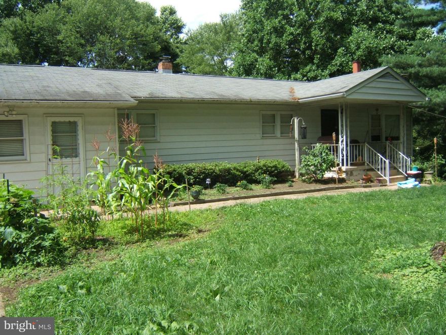 HANDYMAN SPECIAL!!!! HOME IS SOLD IN AS IS CONDITION. LOTS OF POSSIBILITIES ALMOST 2 ACRES IN THE HEART OF WOODBRIDGE. HOME IS BEHIND THE CAR DOCTOR (OLD ROLLISION BUILDING) ACROSS THE STREET FROM LOWES.  LARGE OVERSIZED 2 CAR GARAGE. THERE IS A TENANT PLEASE CALL FIRST CALL COUNTY TO GET MORE INFORMATION  ON POSSIBILITIES!!!! AGENTS  SELLER IS HAVING COUNTY SEWER PUT IN BEFORE SETTLEMENT.