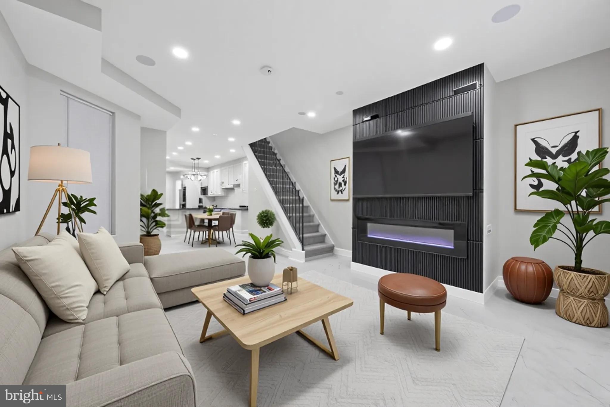 Experience modern living in this fully renovated 3-bedroom, 2.5-bath smart home in West Philadelphia. Featuring luxury marble flooring throughout the first floor and a seamless open-concept layout, this home is designed for both comfort and tech-savvy convenience.
Enjoy top-tier amenities including a voice-activated smart fireplace, built-in smart hub with surround sound speakers, a 75” smart TV, and a Ring doorbell camera with live visual access through the central hub. Ask Alexa to control your fireplace or music with just your voice, say phrases such "Alexa, turn on the fireplace" or "Alexa, turn on the speakers".
The stunning kitchen features Samsung Bespoke stainless steel appliances—Samsung’s most high-end line—offering premium performance and sleek, modern design. A private rear deck provides additional outdoor space for entertainment or relaxation.
Upstairs, the layout includes a Jack and Jill bathroom shared between two bedrooms, while the primary suite features its own private bath.
**Key Features:**
* Smart home automation with Alexa integration
* Ring security camera system
* Smart 75” TV and fireplace
* Luxury marble floors (first floor)
*Samsung Bespoke stainless steel appliances*
* Jack and Jill bathroom
* Primary bedroom with en-suite bath
* Rear deck
Move-in ready and located in a growing neighborhood, this home blends innovation with style.
Disclaimer *two photos are virtually staged*