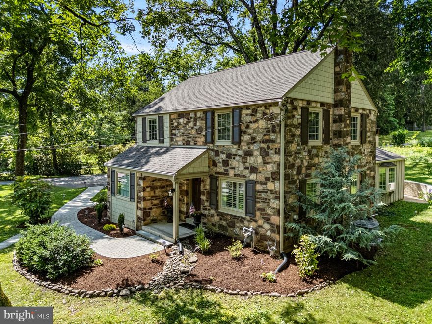 Welcome to 79 Crestline Road—a charming stone Colonial set on a generous .55-acre lot in the highly desirable Strafford Village neighborhood. Ideally situated within walking distance to both the Strafford and Wayne train stations, as well as downtown Wayne, this beautifully expanded and updated 4-bedroom, 3-bathroom home combines thoughtful renovations with timeless style and a spacious, functional layout.

Inside, rich hardwood floors flow throughout the first and second floors, complementing the home's open and airy layout. The first floor features a sun-drenched living room, a formal dining room highlighted by an exposed stone wall, and a cozy family room with a wood-burning fireplace and additional stone accents. At the heart of the home is the stunning gourmet kitchen, complete with a 10-foot island, quartz countertops, marble backsplash, stainless steel appliances, a wine chiller, and new stove and refrigerator (2025). Pendant lighting, seating for 4 at the island, and ample pantry space make this kitchen both stylish and functional. The fourth bedroom with ensuite bath on this floor is perfect for guests or can be used as a home office. A spacious mudroom with neutral tile floor connects to the attached two-car garage and provides easy access to the back patio and yard—ideal for entertaining or everyday outdoor living.

Upstairs, the spacious primary suite includes an updated en-suite bath with double vanities and a walk-in shower with a sleek glass barn door. Two additional bedrooms share a renovated full hall bath with a tub/shower combination. The home’s three bathrooms have been completely updated within the past 10 years.

This home is serviced by the award-winning Tredyffrin-Easttown School District. 79 Crestline Road is a timeless yet modern home in one of the Main Line’s most desirable communities—don’t miss this special opportunity.
RECENT UPDATES: New HVAC in 2025, Fresh Paint throughout 2025, New stainless refrigerator and gas 5 burner stove 2025.  
NEIGHBORHOOD INFORMATION: This home is part of the Strafford Village Civic Association, which hosts numerous events throughout the year, such as a 4th of July Parade and Picnic, Fall Progressive Dinner, Trick or Treating, Holiday Party, Luminaries, and more. The property is ideally located within walking distance to both the Strafford & Wayne train stations, Downtown Wayne, the Tredyffrin Library, and is close to Rt 476, 202, King of Prussia Town Center, and Mall.