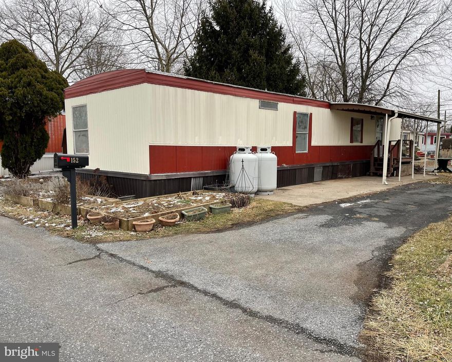 Welcome home to 152 Park Drive in Middletown.  This charming 2 bedroom 1 bath home within the Lisa Lake Community offers comfortable, single floor while being conveniently located to local amenities. Enjoy some peacefulness while relaxing on the spacious patio area and small yard or try your green thumb with gardening in existing raised beds. Homeowners have access to the community's private lake and boat launch!  Here’s your opportunity knocking! Call for your private tour today.