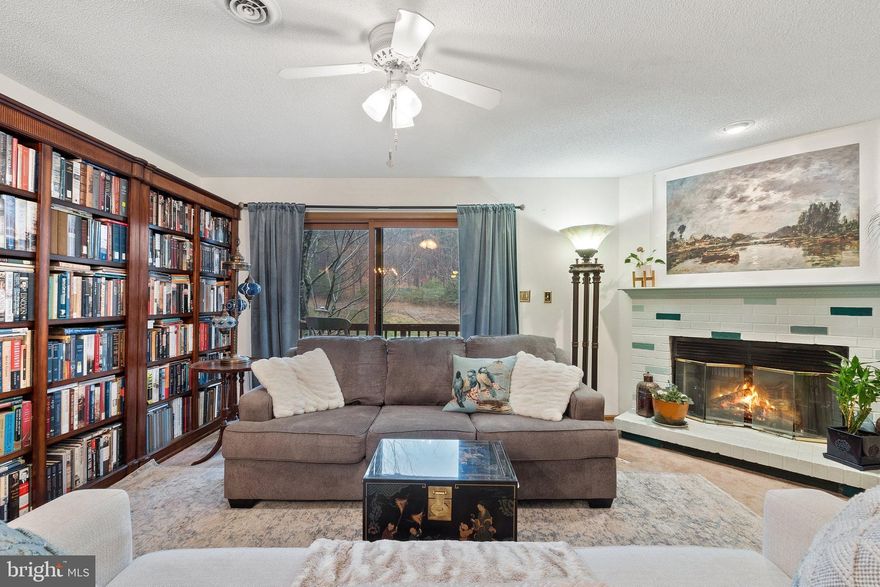 Relax and unwind at The Woods located in desirable Hedgesville WV. This lovely townhome sits on the 17th hole of the Mountain View /Stony Lick Golf Course with exquisite views. The main level opens to the living/dining area with a brick fireplace, an outside deck, and a spacious main level bedroom with a private bathroom. The second floor boasts two bedrooms, each with spacious closets. The larger bedroom features a separate jacuzzi tub, shower, and its very own balcony. The Woods Association  is responsible for association maintenance, landscaping, snow removal, road maintenance and trash pick up. The Tomahawk Townhome Cluster Association  includes building maintenance, landscaping, paint, and preventative building maintenance keeping your investment protected. This home includes a Class B membership which includes 2 outdoor pools, 1 indoor heated pool, sports center (gym, indoor tennis, racquetball, pickleball, spa and clubhouse), restaurant discount program and more. Don't miss this opportunity and book a showing today!