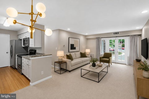 Photo of 5905 Noblestown Road #F, SPRINGFIELD, VA 22152 (MLS # VAFX2338392)