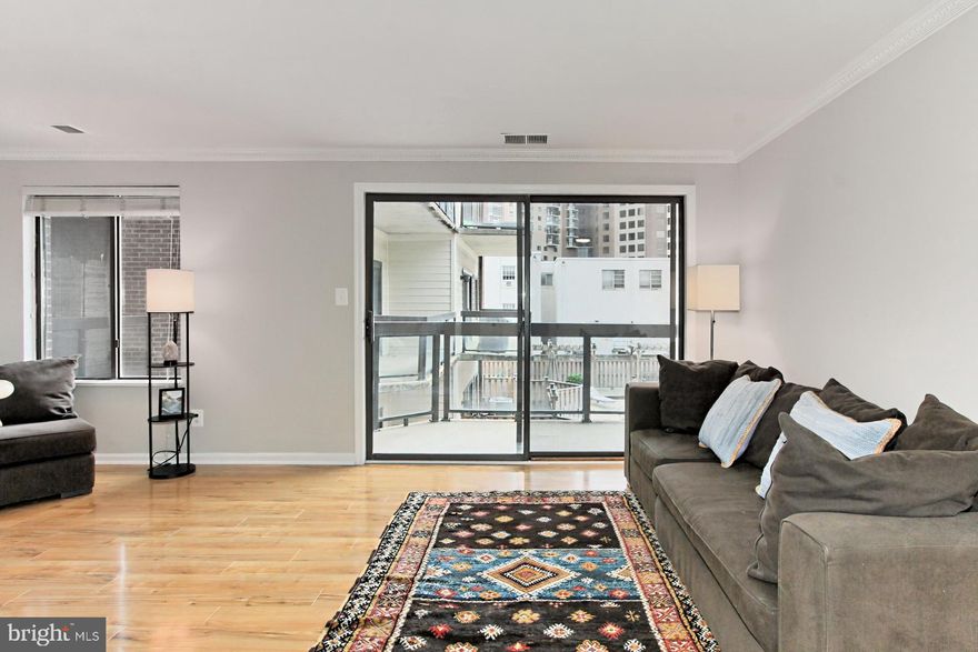 Welcome to Unit #209 at 1020 N. Stafford Street in Arlington, Virginia! Nestled in the heart of Ballston at Summerwalk Condominiums, this enchanting 1 bedroom, 1 bathroom home offers a convenience in commute and, at the end of the day, a serene place to come home and enjoy. Meticulous maintenance, an open floor plan, fresh on trend paint, new lighting and flooring, decorative moldings, and a balcony with courtyard views create instant appeal.   Brand new hardwood-style laminate flooring in the entryway welcomes you home and ushers you into the bright and spacious main living area featuring a sliding glass door opening to the balcony with views of the courtyard common area with multiple areas for relaxing, grilling, and open air entertaining! Back inside, the dining area boasts ample table space and a pass-through that accommodates bar-style seating. The sparkling kitchen will please the enthusiastic chef with Corian countertops and quality appliances including a new stainless steel ceramic top range, refrigerator with ice maker and microwave and a new faucet and garbage disposal, while a laundry closet adds the ultimate in convenience - a stacked washer and dryer.  Down the hall, the bright and cheerful owner’s bedroom is highlighted by a picture window, generous closet space, and room for a sitting area. The beautifully appointed full bath harbors a separate vanity area, new tile, contemporary lighting, and tub/shower combo. An assigned parking space and storage unit in the garage completes the comfort and convenience of this wonderful home.  The condo's amenities foster a sense of community with a courtyard-style patio and outdoor grilling area, gazebo, private pet walking/grass area, and secured entrance. Commuters will appreciate its central location including just 1 block to Ballston Metro, Pentagon Bus, and other major commuting routes plus everyone will take advantage of the diverse shopping, dining, and entertainment options right outside your door in Ballston Quarter. For a gem of a home in a spectacular community, you’ve found it. Welcome home!