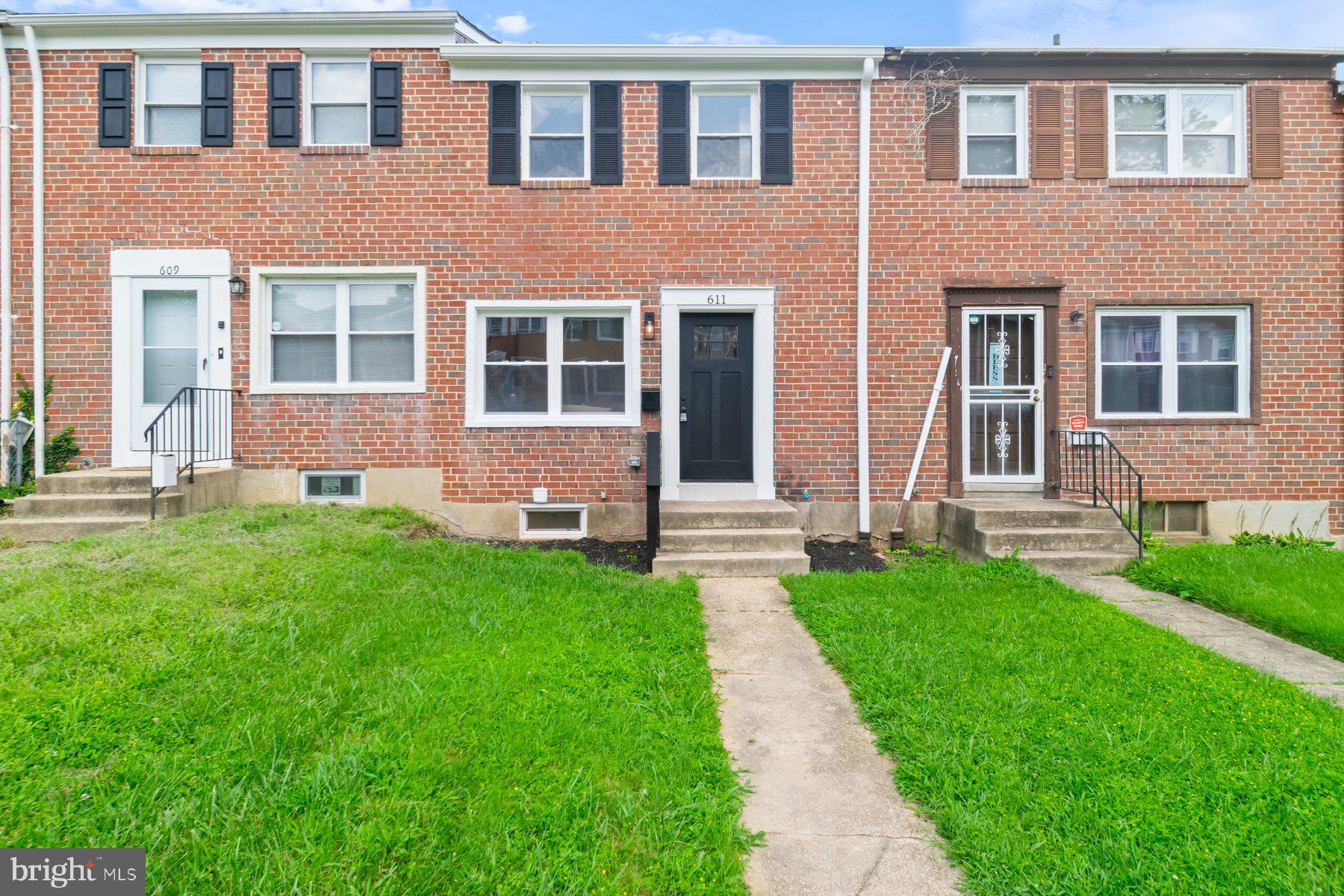 Beautifully renovated and move-in ready 2BR/2BA Townhome located on a quiet street. Make your way past a lush green lawn to the front door of your new home. Step inside to a home filled with natural light, a soft color palette, recessed lighting, and luxury flooring. The main floor offers a large living room with a custom feature wall, and an open floor plan for the dining room and kitchen. The kitchen offers plenty of cabinets, stainless steel appliances, granite countertops, and a deep stainless sink. On the second floor is a spacious secondary bedroom, a large primary bedroom, and a newly remodeled full bath. The lower level offers additional living space featuring a full bath with a walk-in shower, the possibility of a third bedroom, a large family room, laundry, storage, and a walk-out to the semi-fenced yard. From the dining room, step outside to a newly constructed deck that leads to some green space, a parking pad, and so many possibilities. This home is move-in ready with so much to offer new homeowners and is conveniently located to shopping, restaurants, and commuter routes.