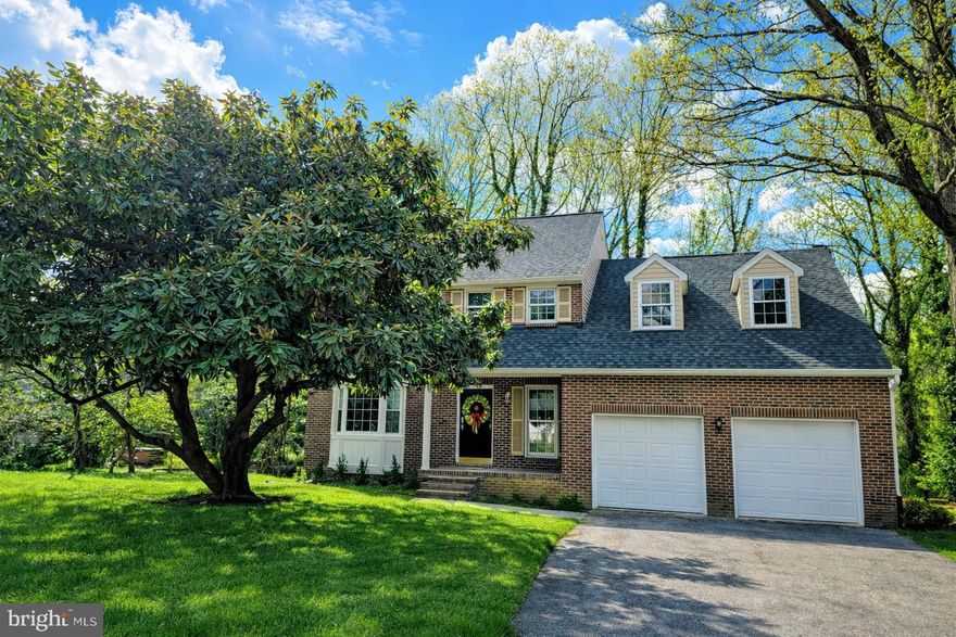 NEW PRICE!!    Briarwood – One of Anne Arundel County’s Finest Communities… Welcome to Rosebay Court!
A mature magnolia tree and inviting covered front porch set the stage for this beautifully updated/renovated brick colonial, ideally situated on a quiet cul-de-sac. Thoughtfully finished and move-in ready, this home is prepared to welcome its new owner.
Inside, a traditional layout blends seamlessly with an open-concept feel, offering both comfort and versatility for everyday living and entertaining. The main level features a welcoming living room, a formal dining room that opens to a  light-filled kitchen     complete with 42” white cabinetry, complementary granite countertops, a breakfast bar, pantry, and coffee nook.  A Samsung appliance suite—including a five-burner stove and French door refrigerator—adds both style and functionality.
The adjoining "great room" is another space for family & friends to gather    This room impresses with vaulted ceilings, skylights, and a cozy wood-burning fireplace—perfect ambience for crisp fall and winter evenings.  At the heart of this space, the breakfast nook offers table space and easy access to the outdoors -- sliding glass doors that open to a new Trex deck, ideal for relaxing, entertaining, starting your day or ending your evening...  . Neutral finishes throughout this home create a fresh look and feel
Upstairs, you’ll find four spacious bedrooms, including an owner’s suite with a private bath featuring dual vanities and walk-in closet. A well-appointed hall bath and ample closet space complete the upper level.
The finished lower level offers incredible flexibility, featuring a full bathroom and level walkout access to the backyard. Whether you envision an in-law suite, guest space, home office, gym, or additional living area, this level is ready to adapt to your needs. Step outside to a newly paved patio overlooking a serene green space, surrounded by nature.
Located in a sought-after school district and just minutes from Route 50, this home offers convenient access to shopping, waterfront dining, marinas, and scenic walking paths. Enjoy easy trips to the Eastern Shore and nearby beaches.
With all new mechanicals and updates ((detailed in the disclosures)), this home offers the perfect alternative to new construction—without the wait.   Move in and start enjoying your dream home this summer!
***  please note  disclosure: some photos have been enhanced with virtual staging/photography ***
