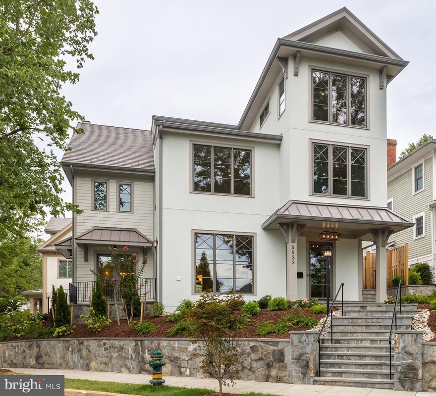 Stunning new construction in Kent from Chryssa Wolfe with Hanlon Design Build. This majestic six bedroom home features over 6,000 interior square feet of extraordinary craftsmanship perfectly suited for modern living. 

The stately front entrance is accented by stone steps and tiered retaining walls which traverse a  professionally landscaped yard leading to a large covered stone porch. The  magnificent mahogany front entrance opens into the gracious home which is ideal for entertaining. The home features an impressive entrance foyer with ample coat closet space and an opulent formal powder room. The foyer also leads to a four level elevator and impressive main stairwell featuring intricate paneling and wainscoting details. 

The expansive first floor features an open floor plan and bathes in natural light. The chef quality kitchen features custom cabinetry, quartz countertops and professional grade appliances . The large family room features an impressive masonry  fireplace with gas starter flanked by elegant custom built-in cabinetry. The kitchen eat-in area is illuminated by an all glass wall/door which opens to the rear stone terrace with an architectural pergola.  The flat  and meticulously landscaped rear yard  provides a peaceful, tranquil escape. A custom cedar privacy fences defines property line with neighboring properties. The rear yard also features a built-in gas grill for outdoor cooking. The first floor is further enhanced by a formal dining room with a Juliet balcony overlooking a picturesque natural setting. The formal butler’s pantry with custom cabinetry and additional walk-in  pantry facilitate  entertaining. The formal living room and dining rooms feature coffered ceilings  and oversized windows /doors providing panoramic views of the charming neighborhood surroundings. An exterior elevated stone terrace connects the formal dining room and living room and features a linear gas fire pit which provides night time ambiance. 

The first upper level is highlighted by an expansive primary suite featuring a lavish master bath and exceptionally large closet  with an elaborate storage system.  Two generously sized secondary bedrooms that share a full bath and a third large bedroom with an ensuite bath are also located on this level. Rounding out this floor is a walk-in laundry room which provides utility and convenience.

The second upper level provides spectacular views and boasts a large and inviting space that can function as a bedroom or office. Also found on this level is a  generously proportioned bedroom with access to a well appointed bathroom.  

The lower level has a fabulous recreation room with a kitchenette complete with custom cabinetry and quartz counters, a cozy fireplace with exotic stone surround, and abundant space for entertaining. The lower level also features a private bedroom and additional full bathroom. A mudroom with built-in cabinetry provides convenient storage. A wide garage provides space for one car parking and storage. 

With shops, restaurants and parks all within walking distance, this exquisite home truly has it all.