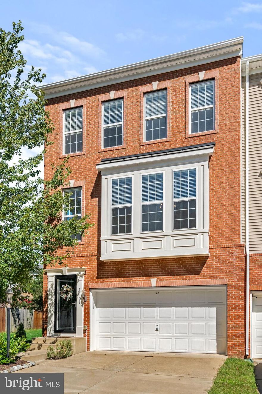 Luxurious townhouse with modern appliances and elegant touches throughout. This townhouse features 3 bedrooms, 2 full bathrooms, 2 half bathrooms, a two-story foyer, 9' ceilings, granite countertops, and a beautifully appointed kitchen with refinished cabinets, stainless steel appliances, and marble backsplash. Additional amenities include: hardwood flooring, an elegant formal dining with crown molding and chair railing, ceramic tile flooring, two sink vanities in the primary bathroom, a walk-in closet in the primary bedroom with custom built-in storage, a brand new washer and dyer, new HVAC system, new carpeting, new window blinds, additional finished storage under the basement staircase, and a professionally painted interior. The open floorplan, finished basement, and well-maintained common areas offer great opportunities for family events in this highly sought-after development! Located near the Town of Haymarket, this property is conveniently located near dining, I-66, and US-29!