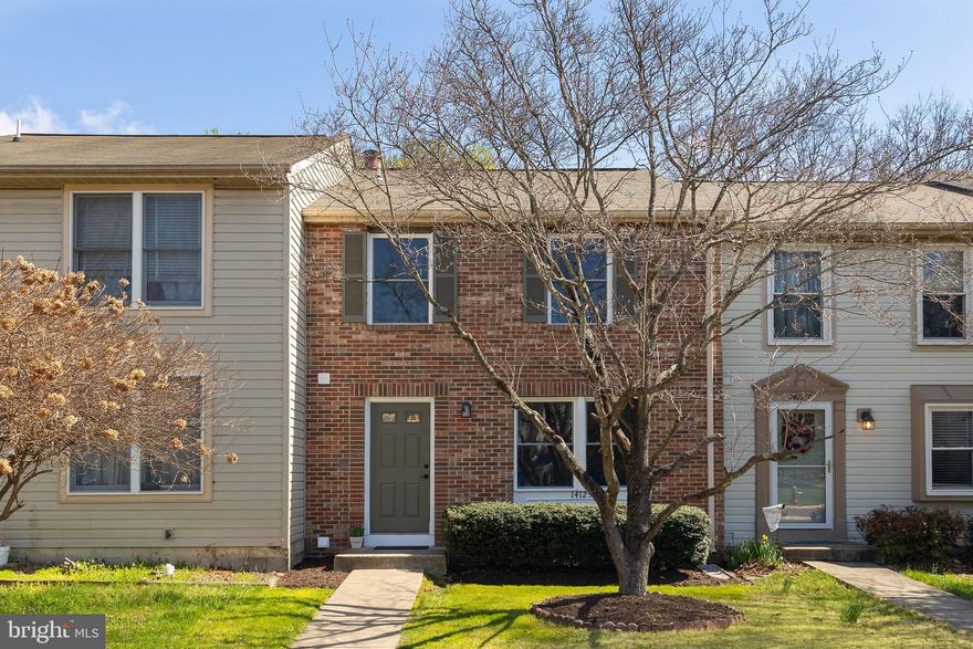 This beautifully renovated three-level brick-front townhome offers modern upgrades in a peaceful, quiet neighborhood. Freshly painted throughout and featuring durable luxury vinyl plank flooring, the home is truly move-in ready.

The main level includes a stylish half bath with tile flooring, a quartz countertop, and updated fixtures. The kitchen is thoughtfully updated with tile flooring, sleek quartz countertops, and brand-new Samsung smart appliances, flowing seamlessly into a separate dining area—perfect for everyday living and entertaining.

Upstairs, you’ll find three comfortable bedrooms. The spacious primary suite features a dedicated dressing area, a walk-in closet, and direct access to the main bathroom. The full bath is updated with tile flooring, a tub/shower combination, and a new toilet.

The finished basement expands your living space with a cozy family/rec room centered around a charming wood-burning fireplace. A convenient kitchenette—complete with a mini sink, refrigerator, and cooktop—adds flexibility for guests or extended living. The basement also includes a separate laundry room with brand-new washer and dryer, and walk-out access to a fenced backyard that backs to serene natural surroundings.

Additional highlights include a roof that is approximately six years old and an HVAC system that is just three years old, offering peace of mind for years to come.

A turn-key home combining comfort, style, and convenience—ready for its new owner.
