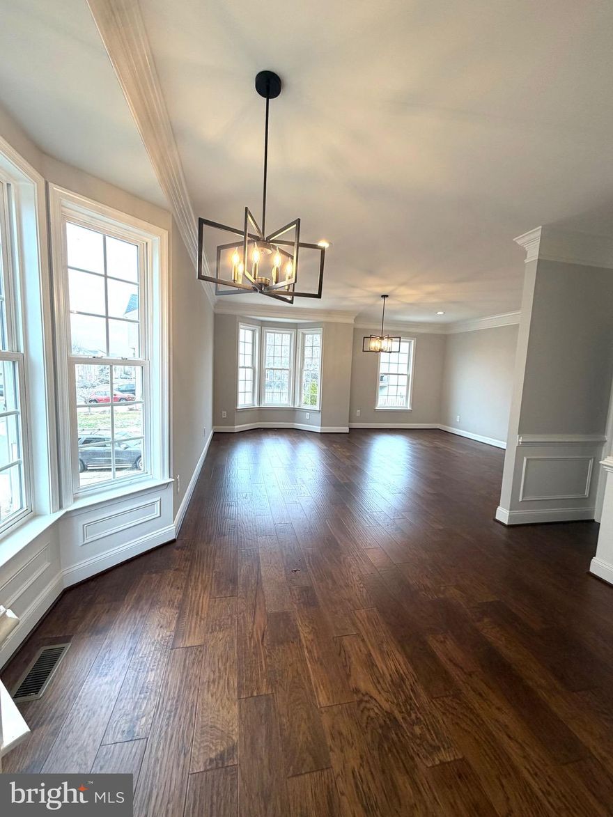 Spacious move-in ready 3 level, 3 bedrooms, 2 full 1 half baths townhouse, located near  commuter routes ,dining and sopping centers!!! Fresh paint through out and all new flooring !!!New kitchen appliances !! Three large bedrooms on the upper level ,each with recess lights !!!. Enjoy the convenience of a two-car garage and a spacious driveway, providing ample parking for you and your guests Enjoy the community pool, playground, basketball court, walking trails, and more.