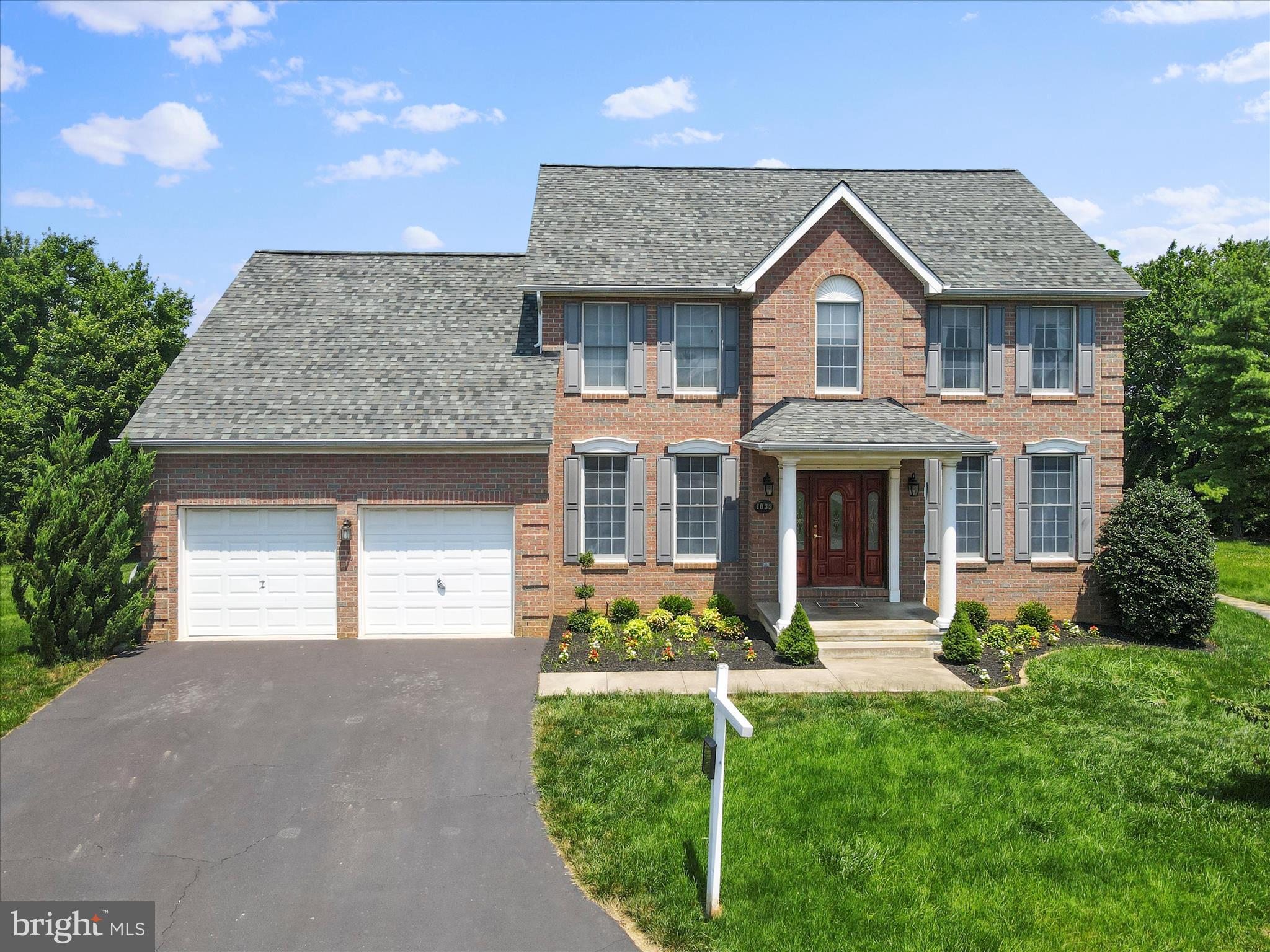 ***Assumable VA loan available at 2.5% interest rate, for qualified VA buyer. ***
Welcome to this well-appointed, Colonial-style home, in sought-after Taskers Chance. This home features a spacious 3,393 sq ft layout complete with 4 large bedrooms and 2.5 bathrooms. The main level of the home features a two-story foyer, private office, a large open concept floorplan and gleaming hardwood floors. The family room is a welcoming space with large windows and a cozy natural gas fireplace. The floorplan flows seamlessly from room to room making it a great space to entertain. The main floor features formal living and dining spaces, as well as a large breakfast room and kitchen. The kitchen comes complete with a center island, newer appliances and generous pantry. Upstairs you are welcomed by 4 large bedrooms, including a primary suite. The primary suite boasts a sitting area, large walk-in closet and bathroom complete with soaking tub and walk-in shower. BUT WAIT…the hidden gem in this space is the large flex room that has been thoughtfully added as an expansion of the primary suite. This insulated space is perfect for crafts, an office, library or just additional living space. It is definitely an unexpected bonus! The partially finished basement offers endless possibilities. This space has plenty of storage, large rooms and is currently set up with a theater area. The outside of this home is gorgeous! Boasting a premium lot, backing to common space, you can enjoy the .19 acre fenced yard or view of the mountains from the large deck. The exterior of the home has been recently upgraded with paint and landscaping (2025) and newer roof (2019). This home has so much to offer, including exceptional energy efficiency. In addition to this amazing home, the new owners can also take advantage of community amenities; including a pool, playground and walking paths.