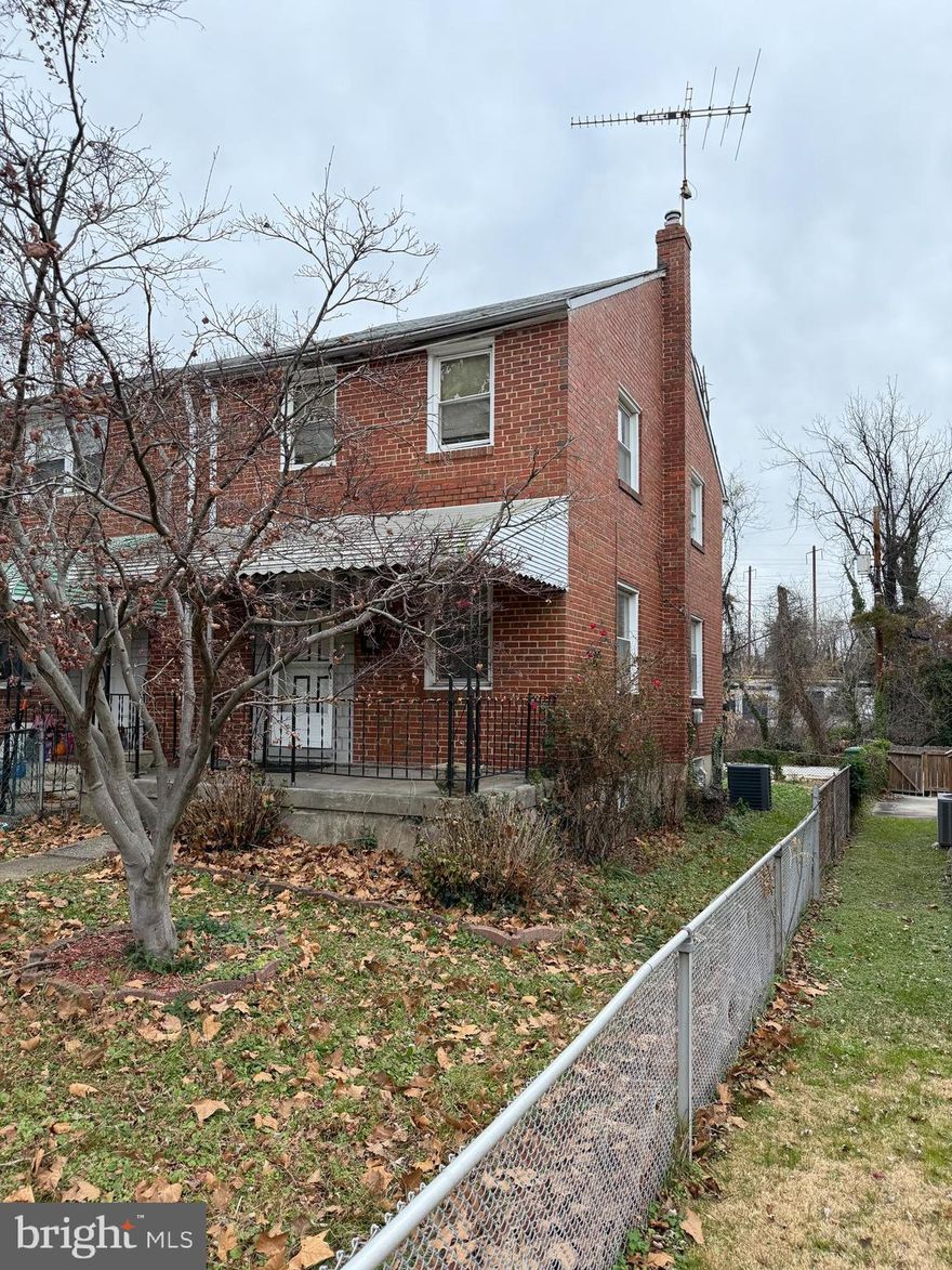 Prime rehab opportunity; 3BR Rowhome Across from Ascension Saint Agnes Hospital w/ Private Parking. Rare three bedroom unit, in an area where many homes offer only two, is ready for a full top-to-bottom renovation. Features include a covered front porch, fenced yard, a rear parking pad, property backs to the alley and trees. Original wood floors may be salvageable. Excellent location directly across from Ascension Saint Agnes Hospital with strong ARVs in the $170,000 - $200,000+ range. Offers due Tuesday, December 16th at 12 PM. Cash, rehab loans, or private financing only.