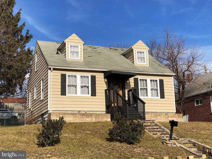 Welcome to your charming cape cod home, situated on a double lot, in the picturesque mountains of Western Maryland.  This home is located in close proximity to both middle and high schools. This remodeled residence features three cozy bedrooms and one beautifully updated bathroom, with a fenced-in back yard and off-street parking.  As you step inside, you'll find a quaint kitchen that boasts a large center island and pass-through, allowing seamless service to the adjacent living room - making this space ideal for entertaining. The exposed brick flue between the kitchen and dining room adds unique character to the rooms, and is complemented by decorative wood planks adorning the back wall and ceiling. The gleaming hardwood floors throughout the home create warmth, while the faux painting on the second floor adds a touch of charm.  The updated bathroom on the main floor features a luxurious walk-in ceramic tile shower, with a built-in seat for convenience. Step out onto the back porch and you will find an inviting spot to relax on the swing, enjoying peaceful summer evenings. Take notice of the various intricate wall hangings throughout the home, that were made from original pieces of this house. You won't want to miss this delightful home. Call Today to Schedule a Tour!!!