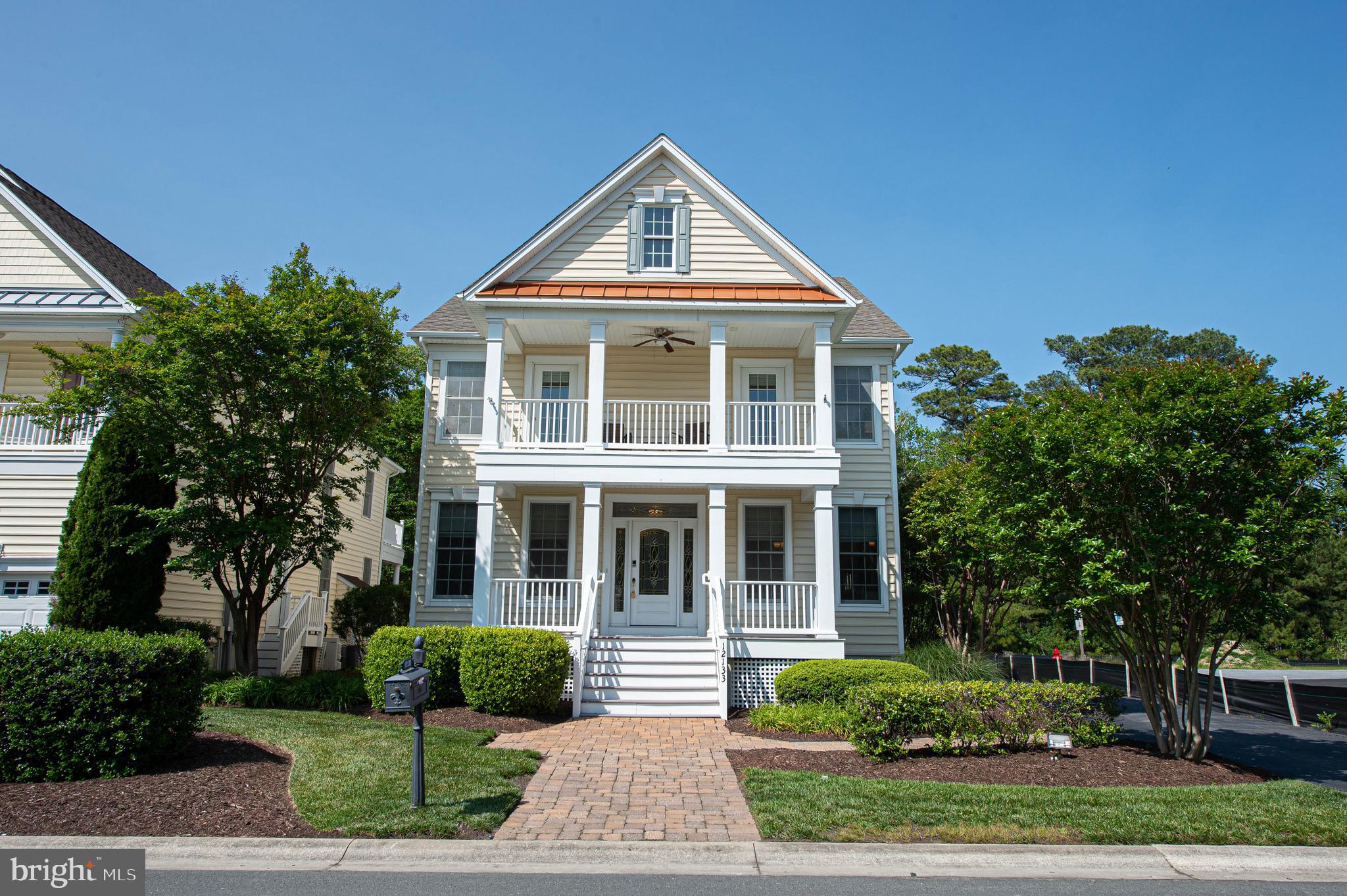 Beach Getaway - turn-key 5BR/4.5BA coastal contemporary - quality-built by Toll Brothers in amenity-rich Landings at Bayside Community - minutes to Downtown Ocean City or Assateague Island. Community amenities include 2 piers, indoor and outdoor pools, incredible community clubhouse, kayak launch, crabbing pier, fitness center, nature walk. Gorgeous home - formerly a model home - recently updated, stylishly furnished (conveys with home), and ready for you - complete with incredible details - crown- & chair-rail molding, tray ceilings, and more. Great floorplan with formal living and dining rooms, and a wide open great room - bright and cheery kitchen, breakfast area, and large family room. Butler's pantry off the kitchen w/ a wine fridge, wet bar, built-ins. In the cooler months, cozy up by the pellet-heated fireplace. Durable and gorgeous tile flooring. Upstairs, a restful owner's suite - full, en-suite bath - tile floor, step-in shower, separate jetted soaking tub. 3 additional bedrooms - two with access to the balcony, a 2nd full bath - double-sink vanity, tile floors, and a laundry room w/washer and dryer. The 3rd floor houses a 5th bedroom or media room with private, en-suite bath - tile floor, tub/shower combo. Owners licensed realtors in the states of Maryland and Delaware; agent has financial interest. Sizes, taxes, distances approximate, and for reference only.
