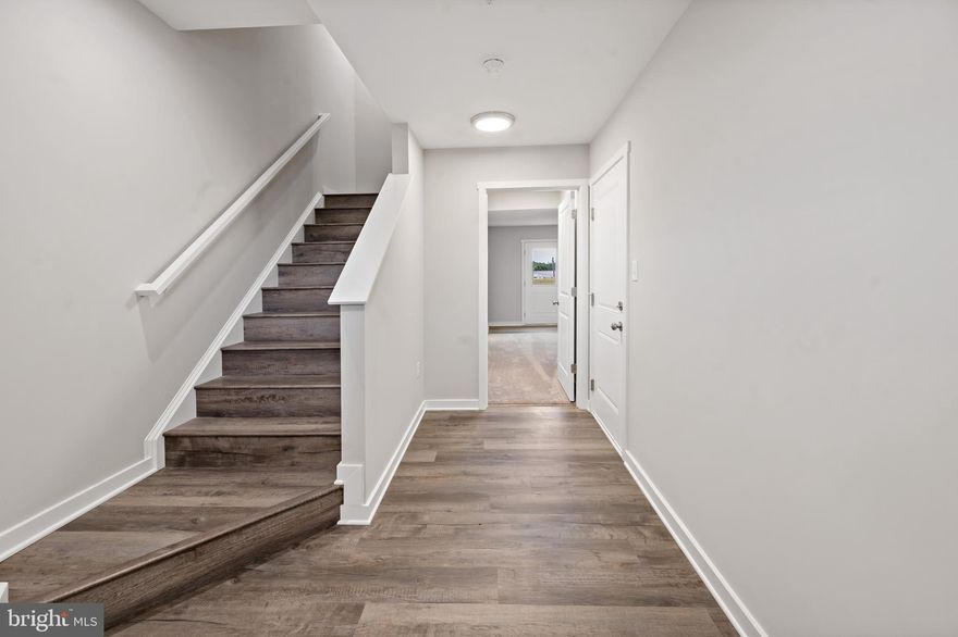 YOUR FIRST YEARS POWER BILL IS ON US!!!! Up to $10,000 closing cost assistance!!!
The Berkeley II Garage townhome pre-sales. December 2023/January 2024 delivery. 
This end-unit 4 bedroom, 3.5 bath garage townhome has an open concept design on the main floor w/ a kitchen island with granite top, 42" cabinets, a high low peninsula with granite top for entertaining, stainless-steel appliances, a large living room w/ a bump out and a half bath. The upper level features a large primary bedroom w/ cathedral ceiling, walk-in closet, double vanity and a walk-in tile shower; two guest bedrooms, one of which has a 2-story bump out, full guest bathroom, linen closet and laundry. The lower levels feature a coat closet, foyer, single car garage w/ automatic garage door opener (app enabled also) and fourth bedroom with a full bath w/ door to access to your backyard, this room makes a great recreation room as well. There will be NO homes built behind you here!!! Throughout the home you will find recessed LED's, ceiling fans in the Primary bedroom & living room w/ each additional bedroom pre-wired for ceiling fans. High/Low outlets w/ pass through plates w/ CAT5/COAX/HDMI in Owner's bedroom & living room to make mounting your TV a breeze. You get more for your money with Four Points Construction. We are a featured loaded builder.  Winner of WV Best in Class for Energy Efficiency - The Communities of Burwell has done it again! Pictures are of similar construction townhome.