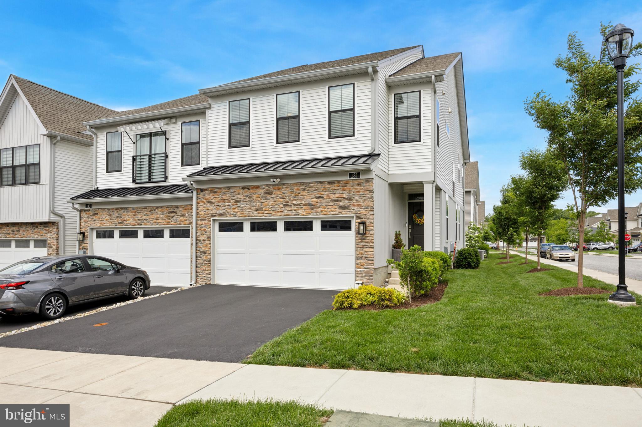A pristine end-unit in highly sought after Franklin Station! Welcome to 131 Junction Road, a 3 BD/3.5 BA home offering contemporary finishes and rustic farmhouse touches. From mocha hardwood flooring and neutral paint colors to an open first floor concept and private patio, this home is fit for homebodies and entertaining extroverts alike. The covered entryway leads into a foyer that can easily be converted into a Pinterest-worthy mud area or an elegant space for guests to settle in. The foyer flows into the open living area, which is sun-soaked and illuminated by custom Pottery Barn lighting fixtures (and shaded by custom shutters)! The kitchen features honey shaker cabinets, brushed bronze hardware, a tile backsplash, granite countertop, stainless steel appliances, pendant lighting, and plenty of additional counter/cabinet space - prime real estate for a coffee nook! There is a deep pantry for ultimate snack storage and organization. In the warmer months, soak in some sun rays from the rear composite deck; sizable enough for a cantilever umbrella, a cozy L-shaped couch, a fire pit, and a few Adirondack chairs! A powder room, coat closet, and two-car garage completes the first floor. The stairs ascend to the second floor, which is home to three airy bedrooms, a dedicated laundry room, a linen closet, and a hallway bathroom. If a true primary suite was on your new home bingo card, you’re in luck. There is en-suite bathroom with a dual vanity, an oversized stall shower, TWO walk-in closets. Oh, and not a single bedroom wall is shared with a neighbor! The basement fully finished and equipped with an additional full bathroom and several storage closets. Central AC. The vibrant community clubhouse offers additional space for lounging or hosting; the pool, gym, business center, and fire pit are few of the many amenities included. Walking distance to Wawa Station. Minutes from The Promenade at Granite Run and Downtown Media. Surrounded by several parks and hiking trails! Located in award-winning Rose Tree Media School District! Offering 1% interest rate BUY DOWN for one year at ZERO cost to buyer when buyer uses homeowner's preferred lender.