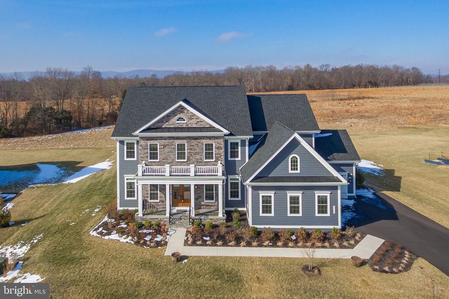 Back on the market!! Why wait to build when you can buy an almost brand new home  and move in right away?? Absolutely stunning NV Homes Regents Park II Model in sought after Willowsford will wow you!! This home has it all! 6 bedrooms, 6.5 baths, and a 3 car garage situated on a half acre plus lot backing to conservancy land. Upgrades throughout including the gourmet kitchen with stacked cabinets, dual islands, 2 dishwashers, beverage fridge, pot filler, and a large pantry; 1st floor bedroom suite; 1st floor study; 2 story Family Room with window wall, coffered ceiling, stone surround gas fireplace with built ins; upgraded Owner's Suite with dual closets and upgraded Owner's bath with dual sinks, large shower, and soaking tub; Basement with wet bar has an additional dishwasher and beverage fridge plus large storage closet; security system, upgraded elevation, central vac, and so much more! Don't miss out on this gorgeous home!