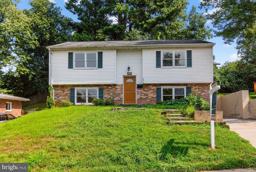 2ND KITCHEN IN THE BASEMENT! Impeccable new listing in Rockville's popular community of Twinbrook Forest! This impressive split foyer property features a main level living room, dining area, and an updated kitchen with plenty of counter and cabinet space! The main level also holds full bathroom. A massive lower level with a separate, side entry, walk-out is perfect for a potential rental/in law suite/at home business and includes two additional bedrooms, kitchen, an updated full bathroom, family room, laundry room, and plenty of storage space! A relaxing backyard deck  that is pefect for quiet summer evening meals, overlooks a private yard perfect for recreation! Enjoy ample off-street parking space with extended driveway!.... SUPERB Rockville location! Just minutes to the area schools, local shopping, Metro, and the trails of Rock Creek Park! Come quickly!