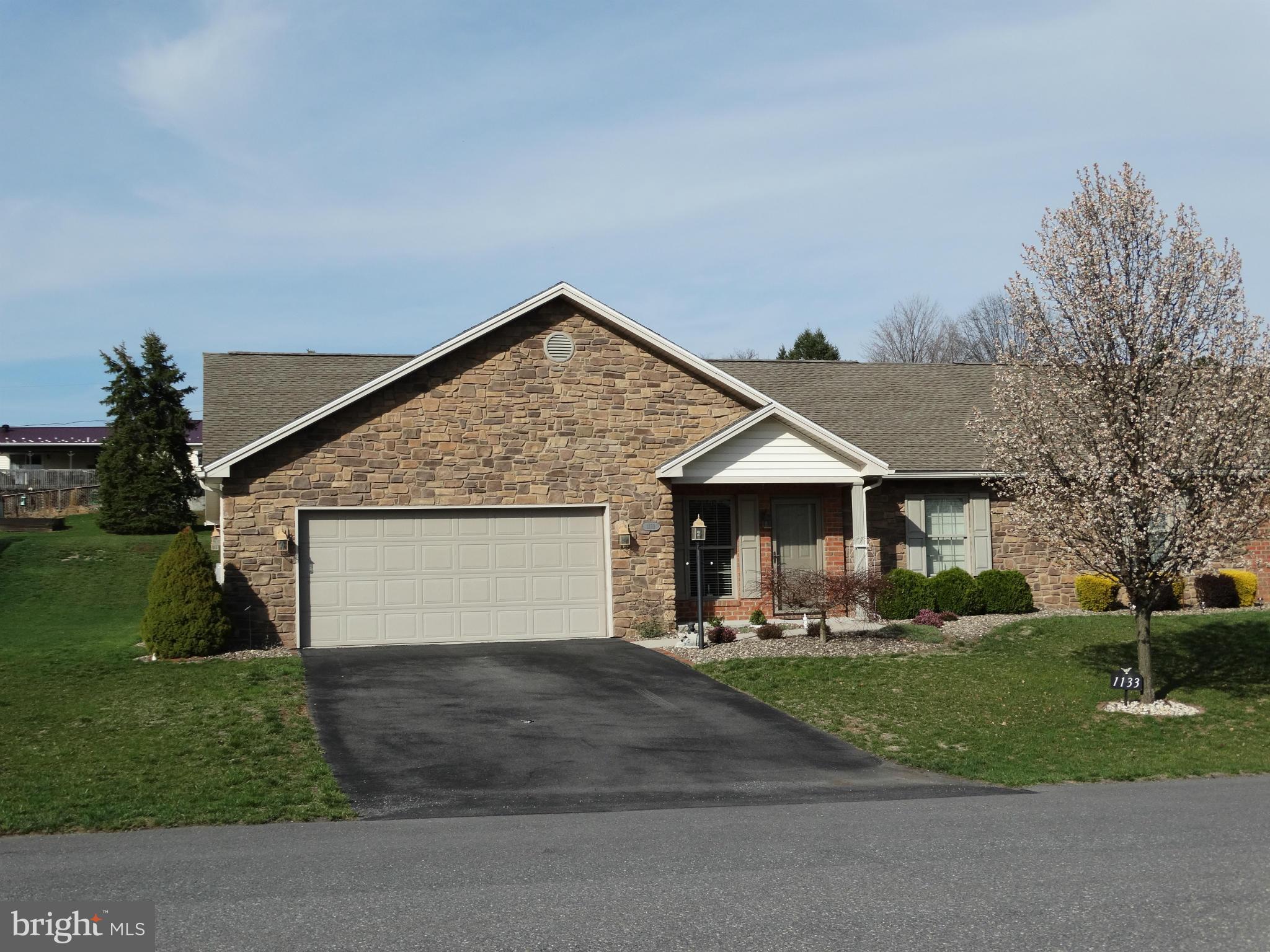 One level living with some handicap items installed, ramp from the garage to the kitchen, grab bars in the master bath. Propane stone fireplace in the family room.