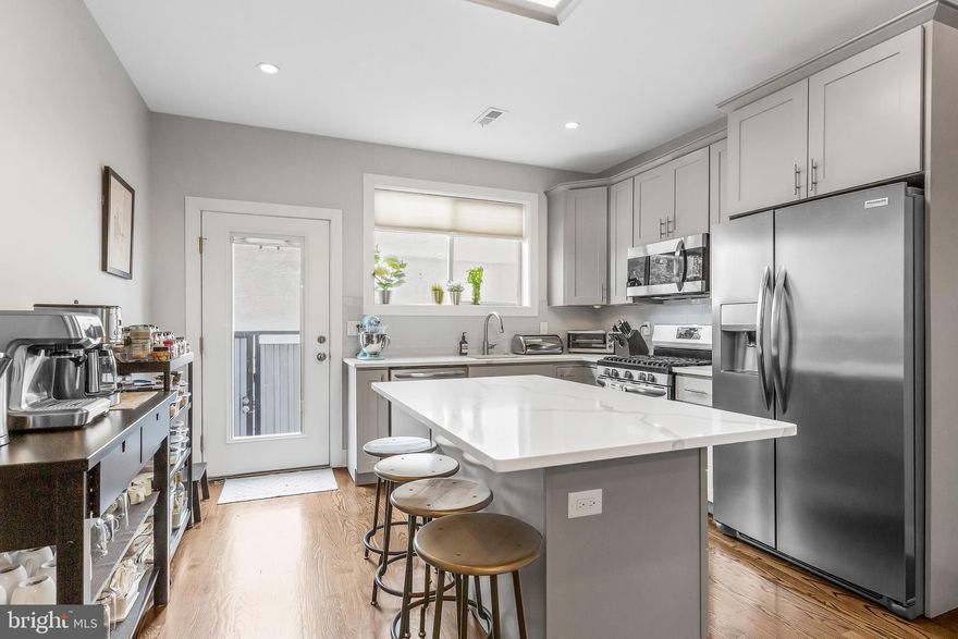 This beautiful 3 bed, 3 bath is the perfect home for entertaining with its open concept living/dining floor plan and outdoor space! The first level includes the living room, dining room and kitchen all flowing together with hardwood floors throughout. Right outside the kitchen door you will find the back patio – great for a summer BBQ! There are 2 bedrooms and 1 full bath located on the second floor and a spacious master suite with a private bathroom on the third floor. Head up to the roof deck to take in some breathtaking views of the city – a great spot to bring guests! The finished basement includes a second living area and a full bathroom.  This home still has roughly 7 years remaining on the tax abatement as well as dual zoned HVAC systems. The location of this gem is right near all the action with just a short walk to some of Fishtown’s best spots! Evil Genius Brewery, La Colombe, Bottle Bar, Frankford Hall, Cheu Noodle Bar, Barcade, Joe’s Steaks, Garage...and the list goes on! Interested in going into Center City? Walk 2 minutes to the Berks Station and hop on the Market Frankford Line! With easy access to all the city has to offer, this home is the perfect spot for someone looking to explore new spots. Check out 1614 N Hope Street today!